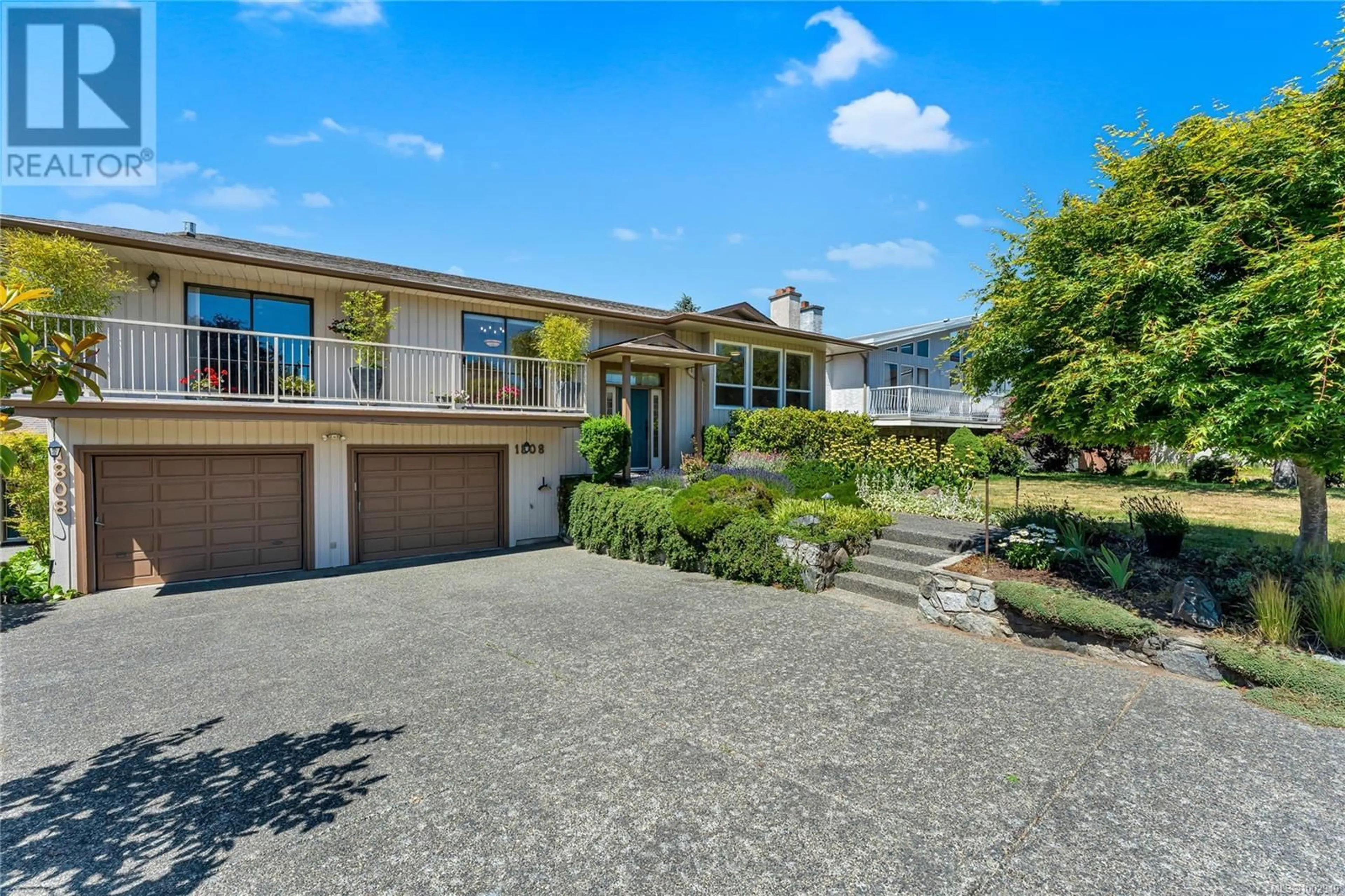 A pic from outside/outdoor area/front of a property/back of a property/a pic from drone, street for 1808 VALENCIA PLACE, Saanich British Columbia V8N5W1