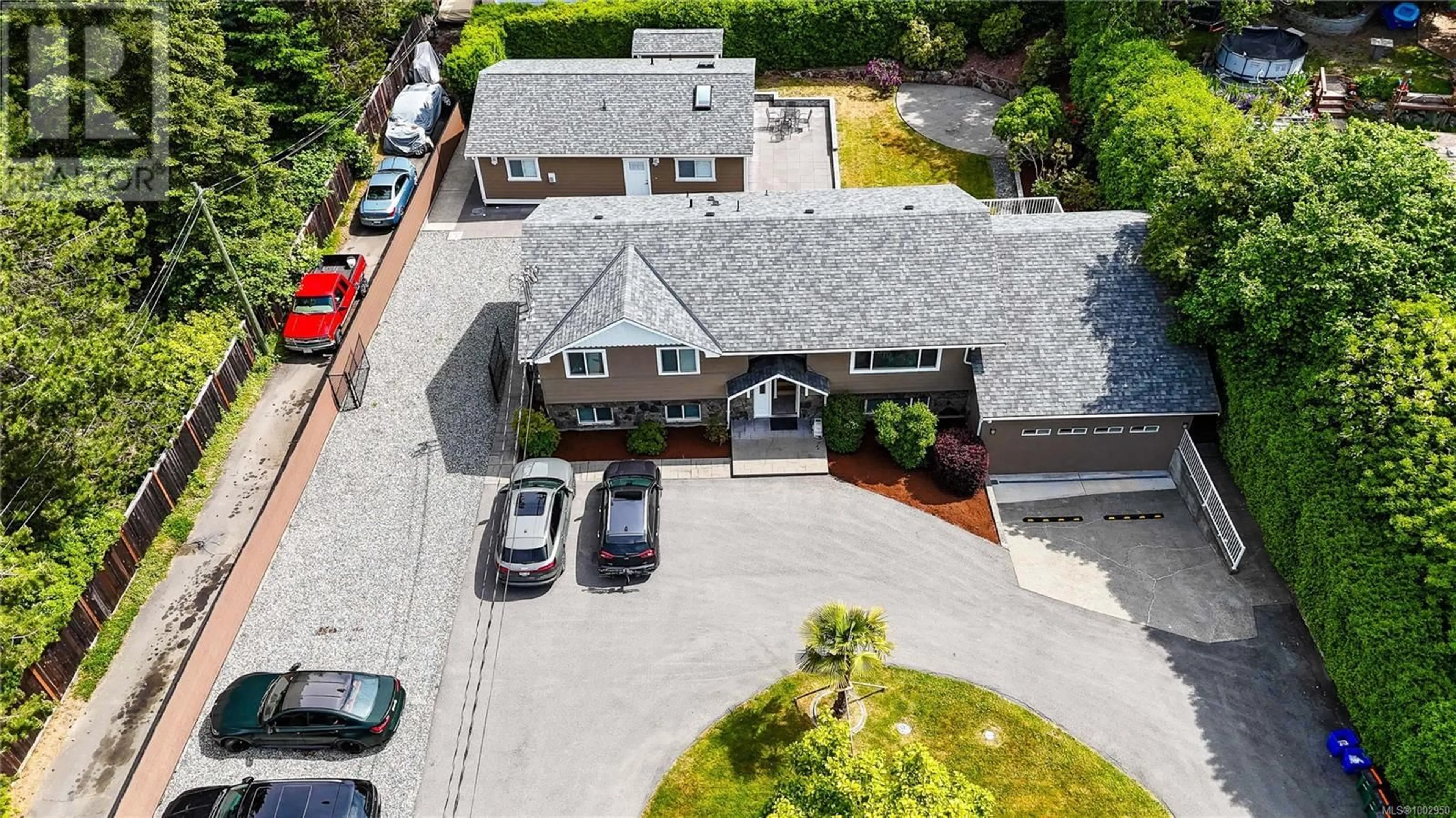 A pic from outside/outdoor area/front of a property/back of a property/a pic from drone, street for 4767 CORDOVA BAY ROAD, Saanich British Columbia V8Y2J7