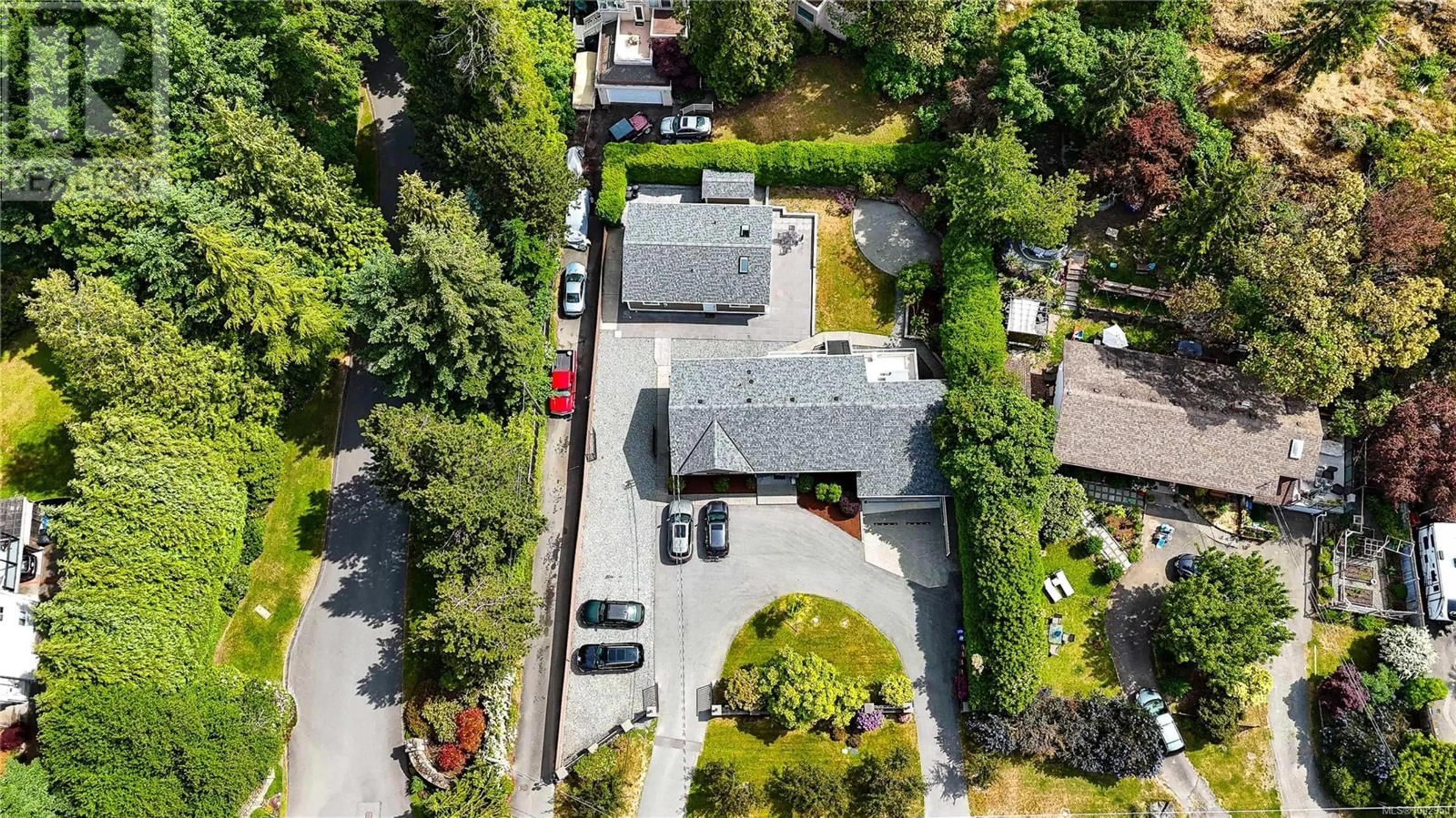 A pic from outside/outdoor area/front of a property/back of a property/a pic from drone, street for 4767 CORDOVA BAY ROAD, Saanich British Columbia V8Y2J7