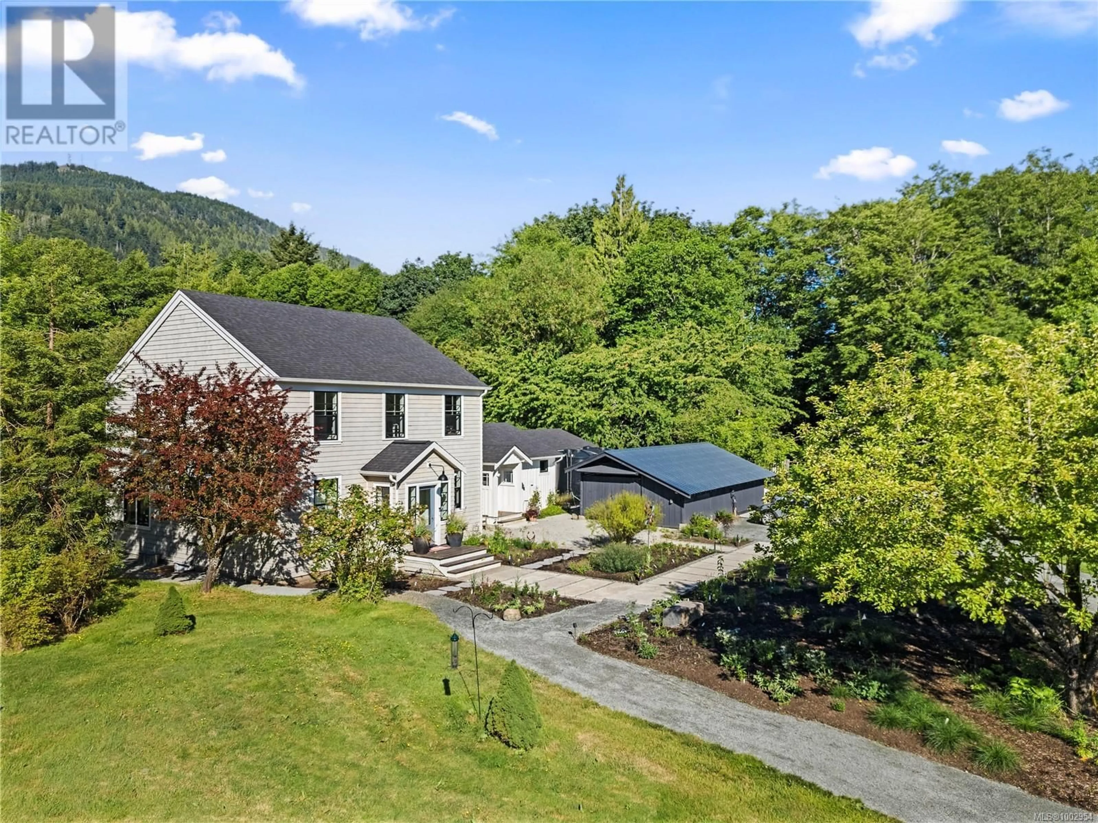 A pic from outside/outdoor area/front of a property/back of a property/a pic from drone, mountain view for 2454 FULFORD-GANGES ROAD, Salt Spring British Columbia V8K1Z4