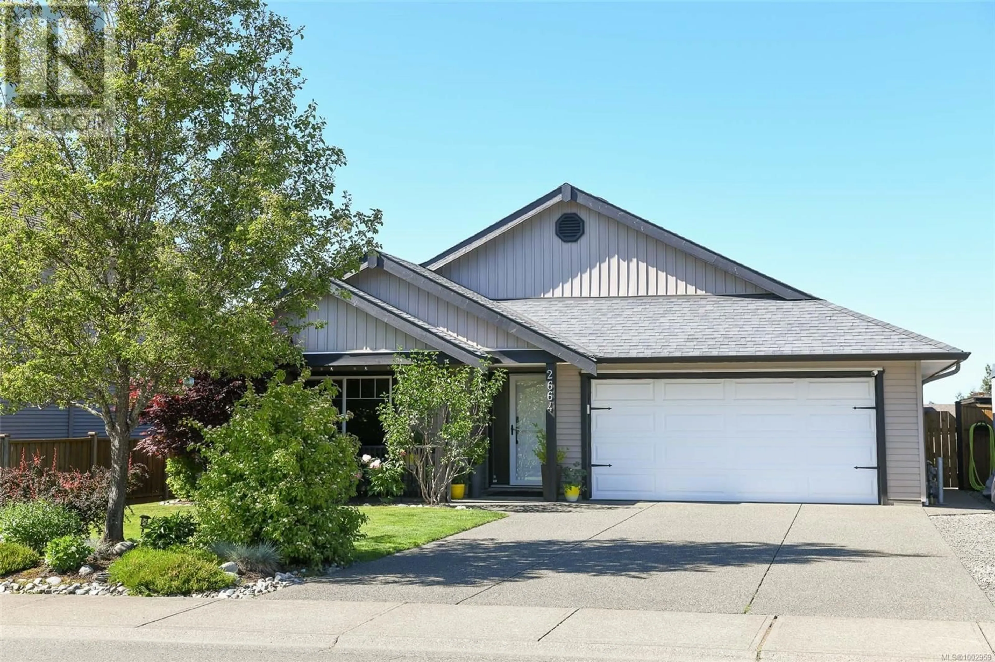 Home with vinyl exterior material, street for 2664 RYDAL AVENUE, Cumberland British Columbia V0R1S0