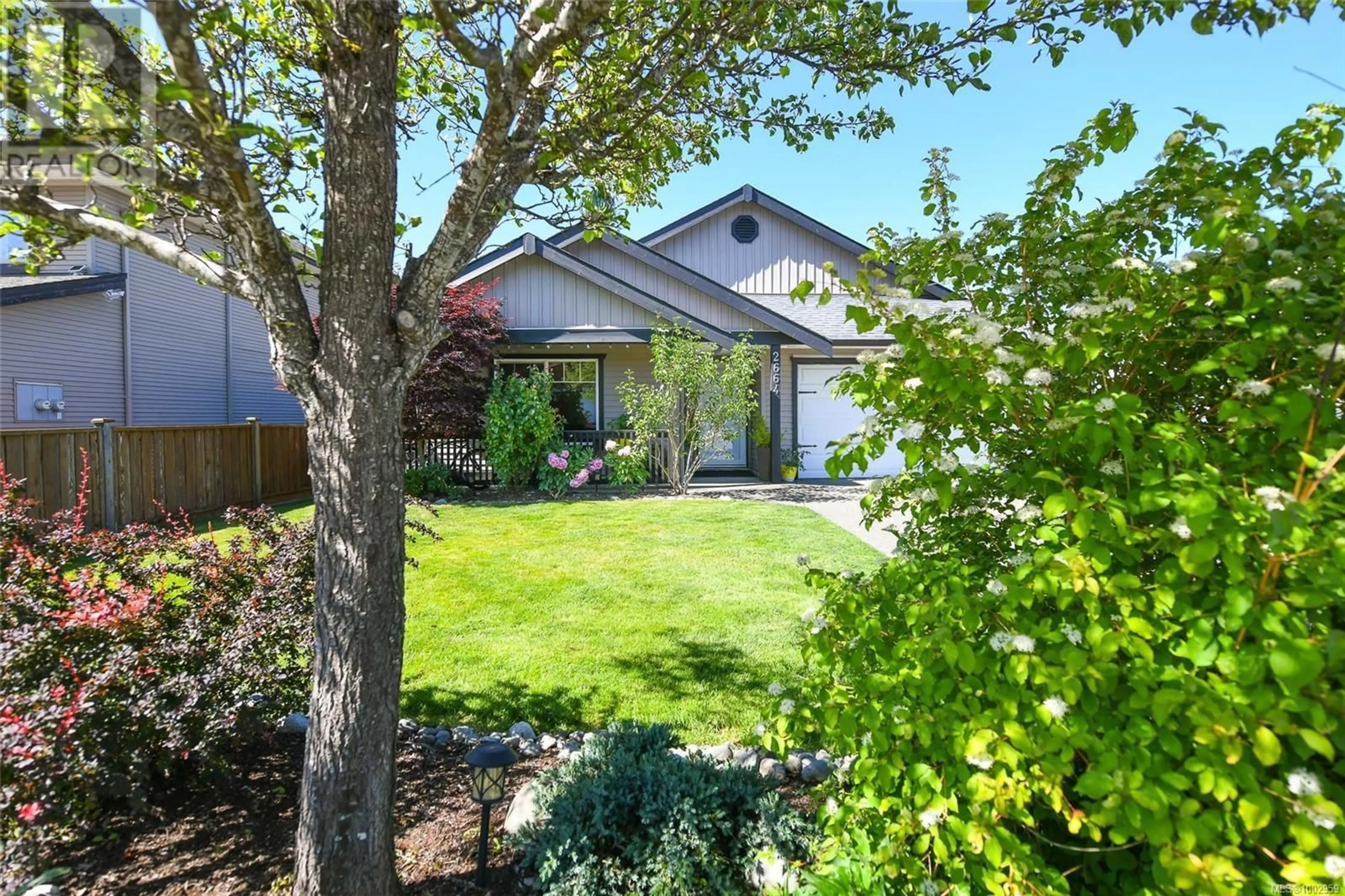 A pic from outside/outdoor area/front of a property/back of a property/a pic from drone, street for 2664 RYDAL AVENUE, Cumberland British Columbia V0R1S0