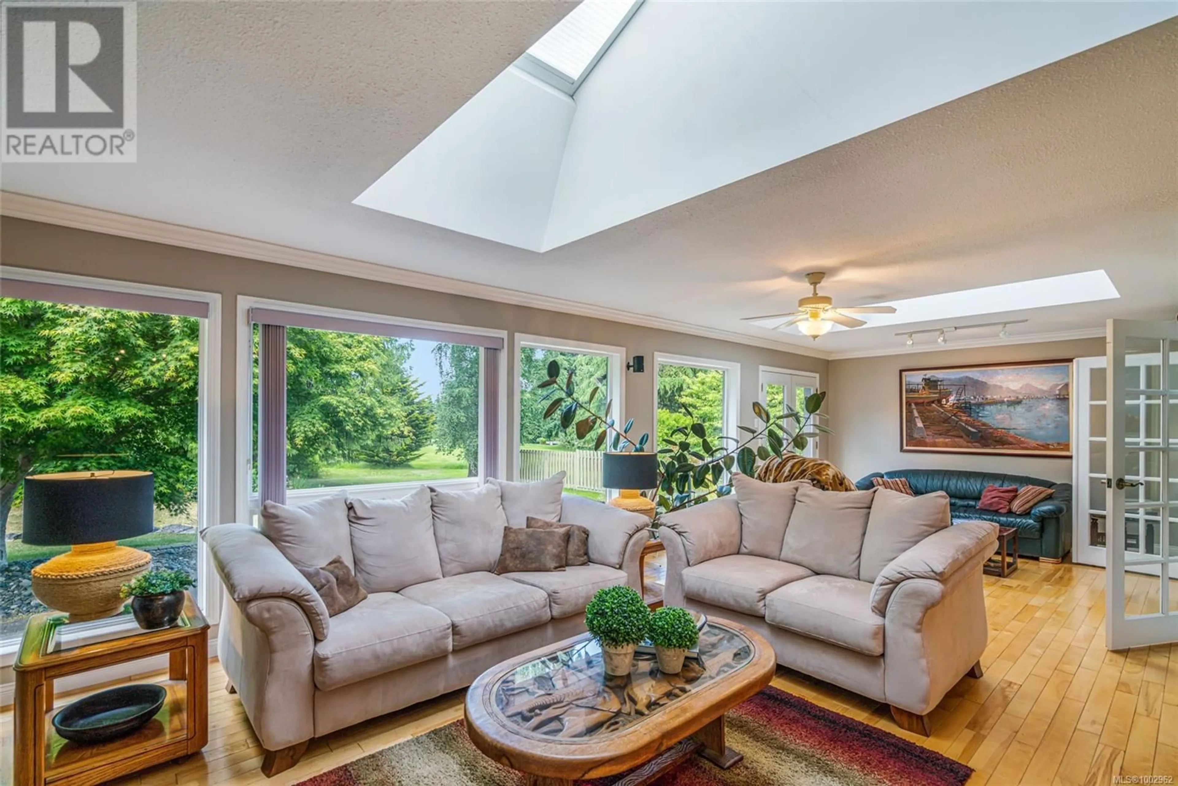 Living room with furniture, unknown for 1023 HARLEQUIN ROAD, Qualicum Beach British Columbia V9K1E2
