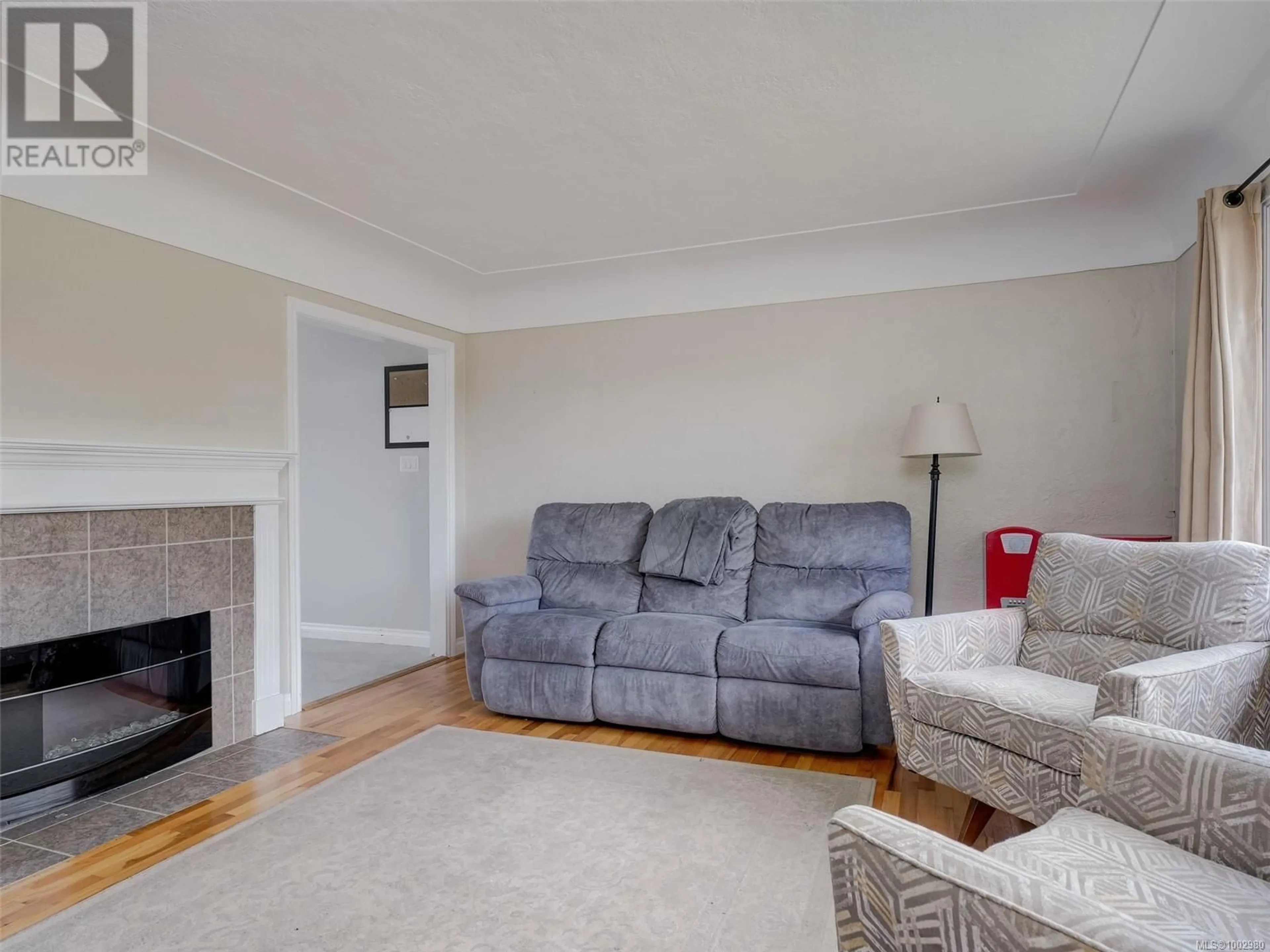 Living room with furniture, unknown for 1856 NEIL STREET, Saanich British Columbia V8R3C7