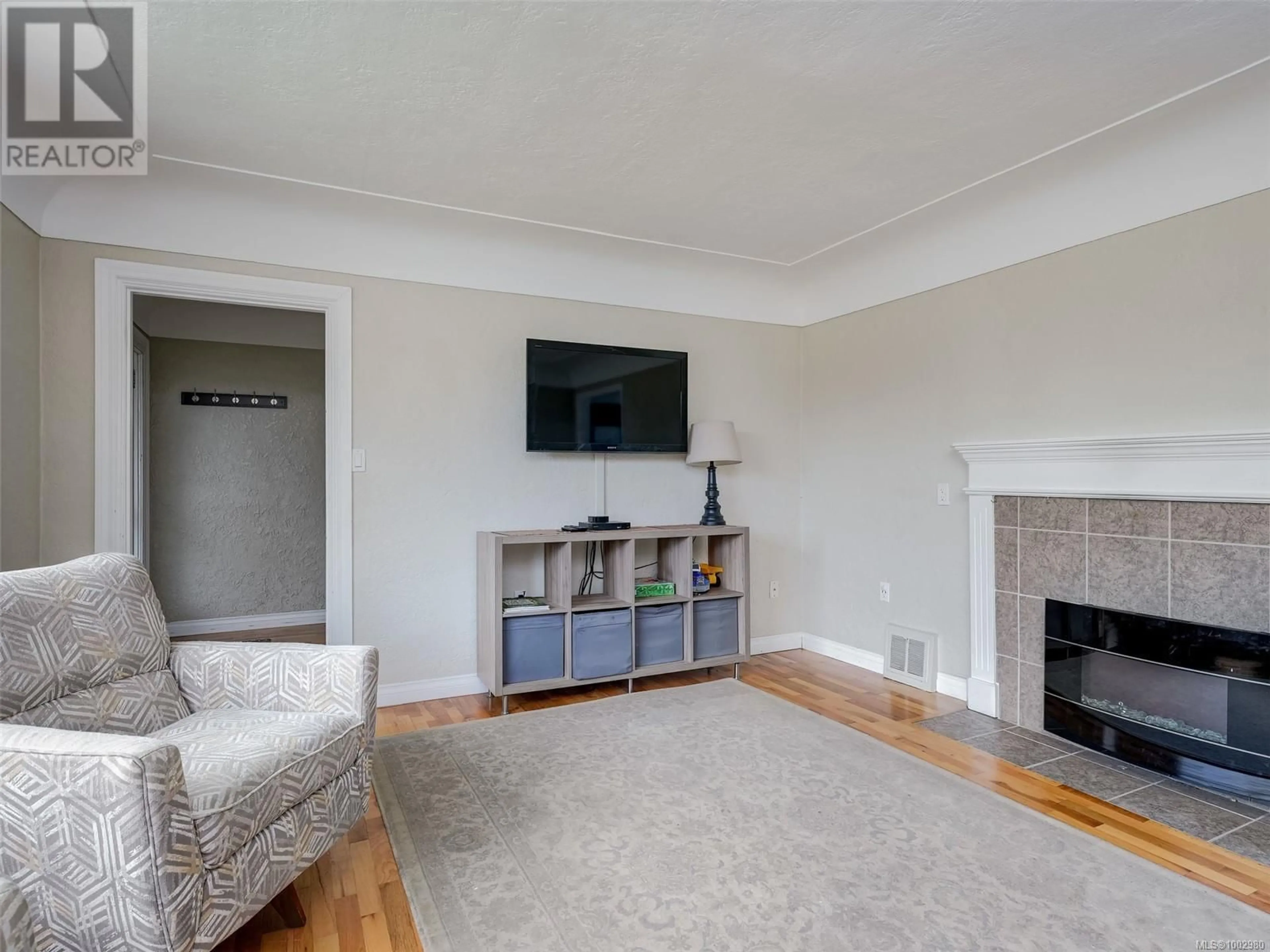 Living room with furniture, unknown for 1856 NEIL STREET, Saanich British Columbia V8R3C7