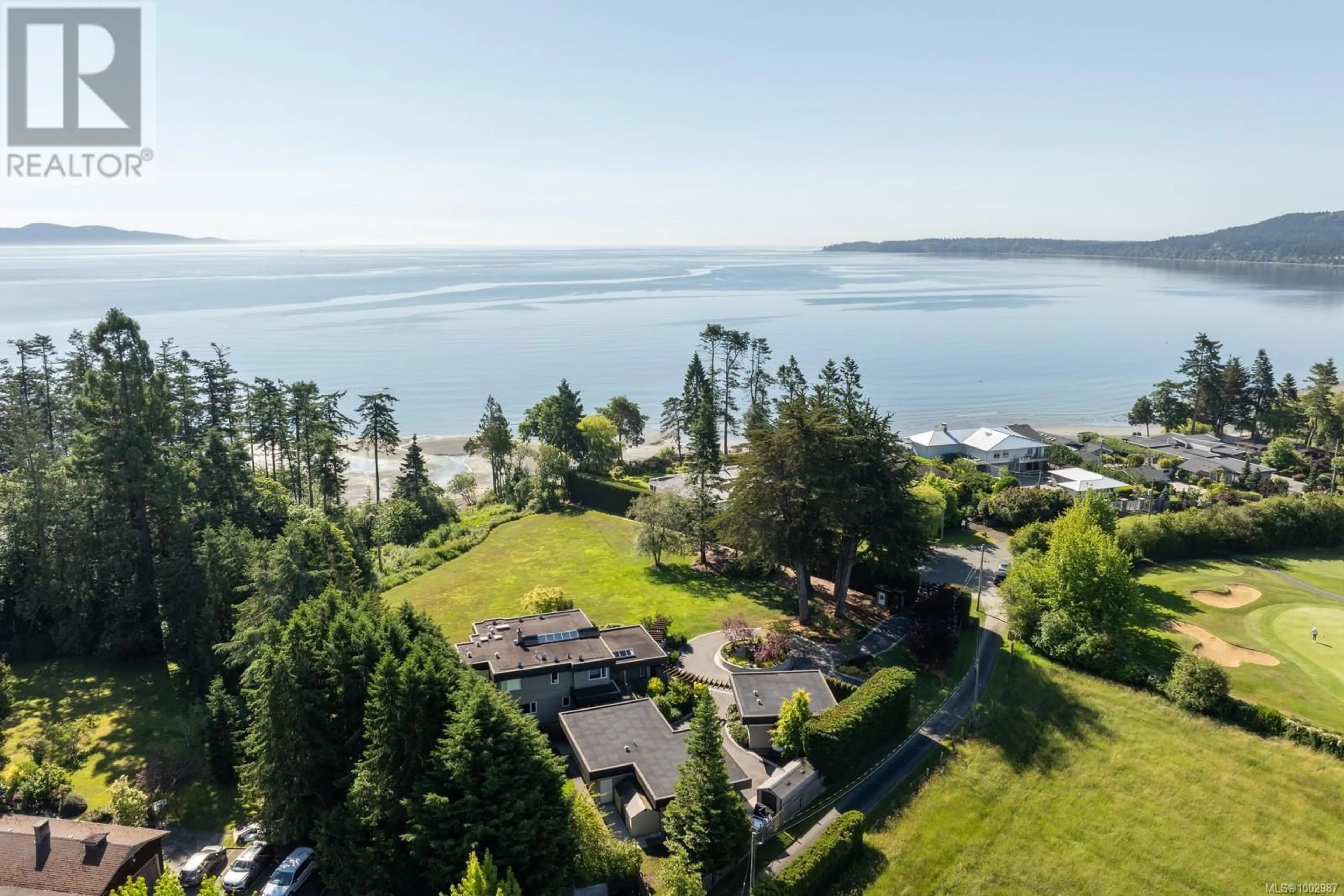 A pic from outside/outdoor area/front of a property/back of a property/a pic from drone, water/lake/river/ocean view for 5605 PARKER AVENUE, Saanich British Columbia V8Y2N2