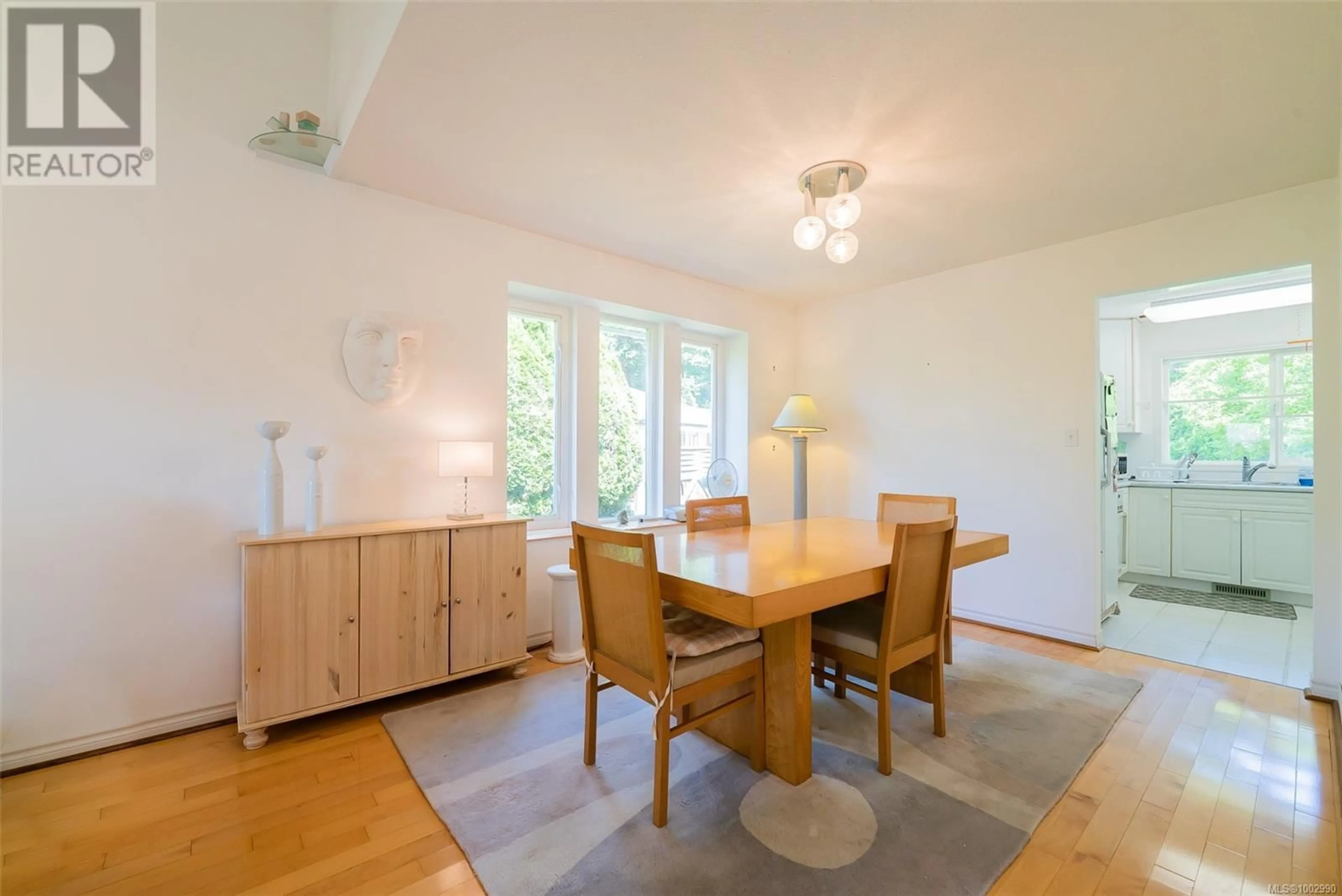 Dining room, wood/laminate floor for 1633 MARINE CIRCLE, French Creek British Columbia V9P1Y7