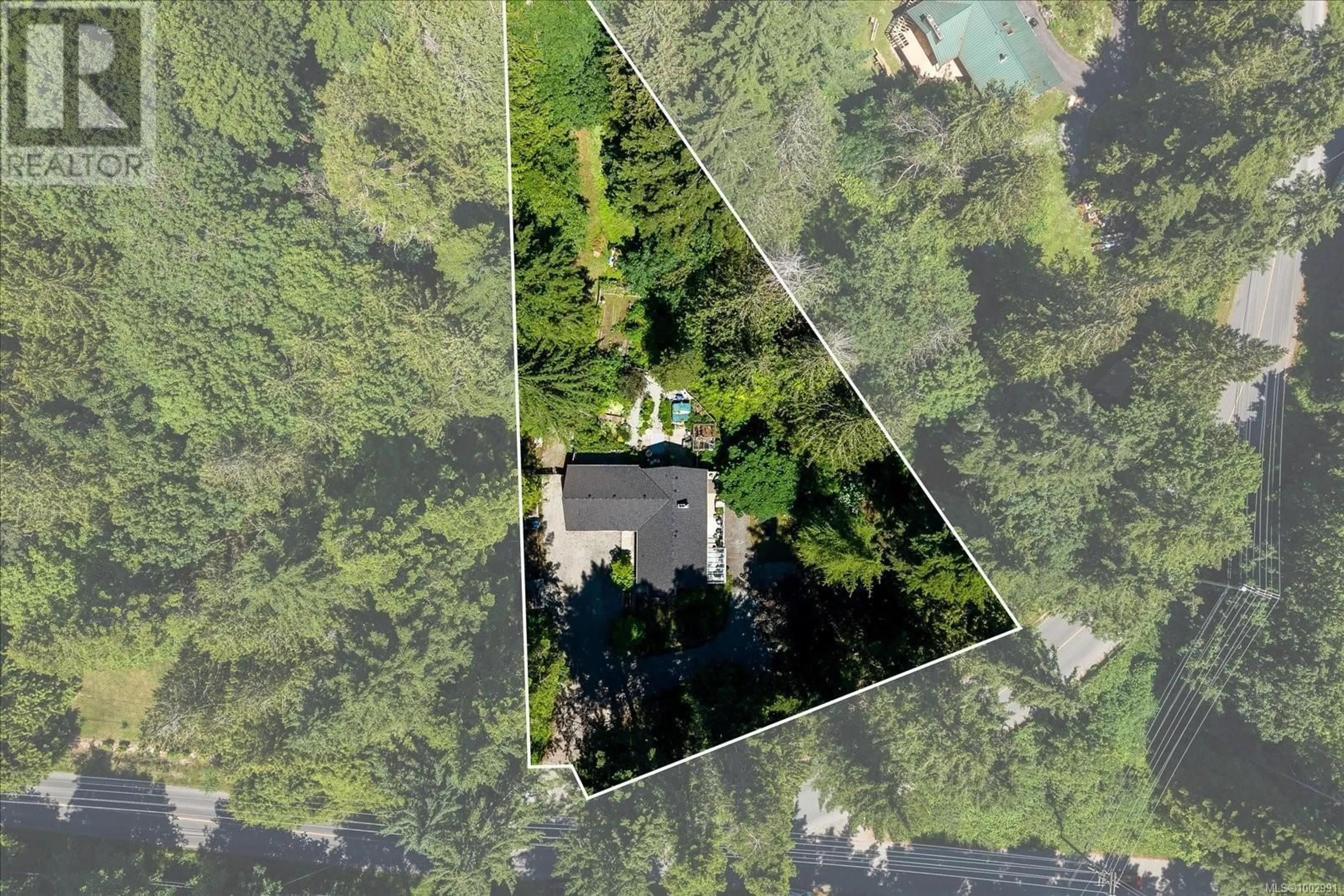 A pic from outside/outdoor area/front of a property/back of a property/a pic from drone, forest/trees view for 2470 HOLDEN CORSO ROAD, Nanaimo British Columbia V9X1M7