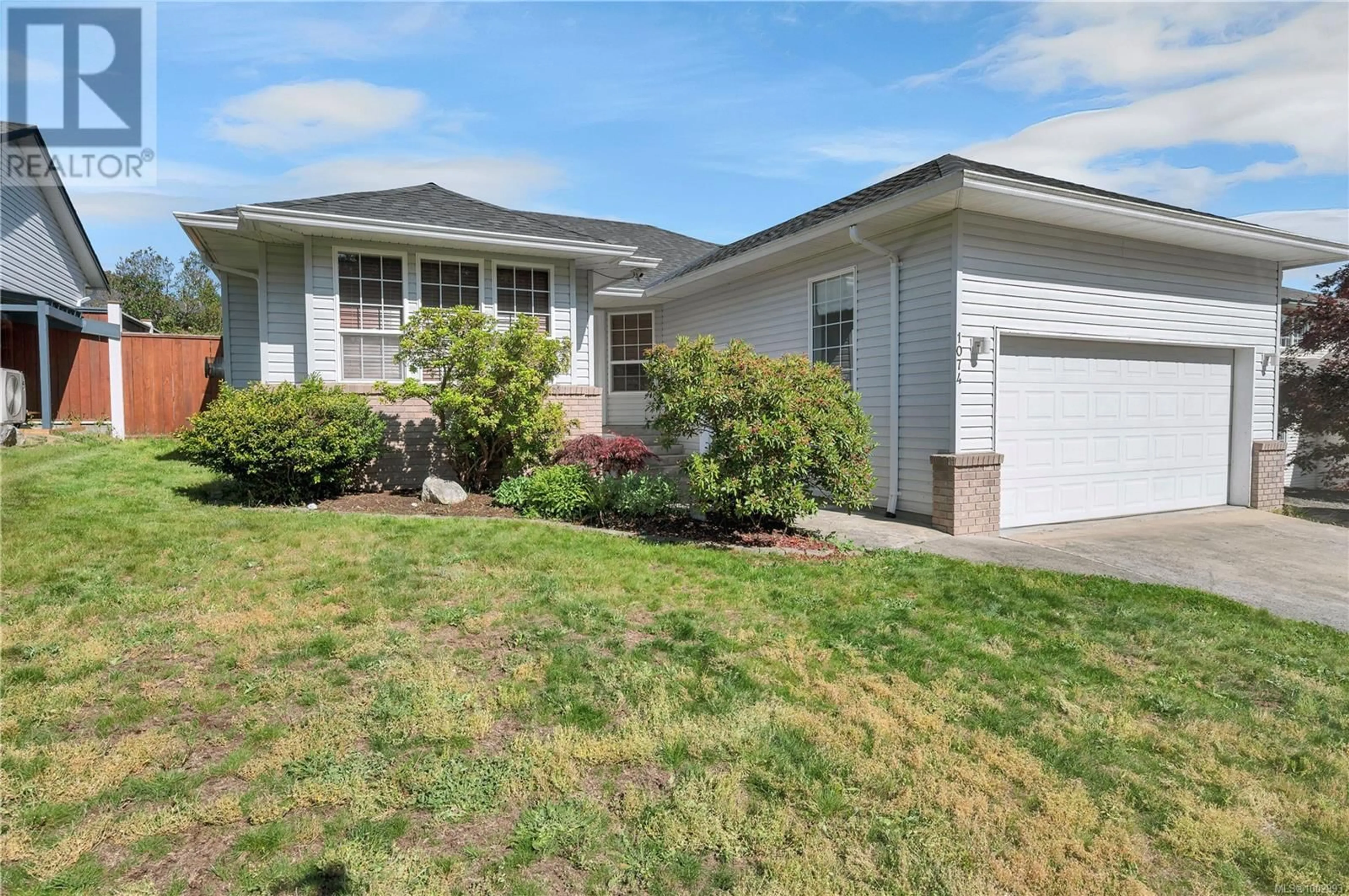 Home with vinyl exterior material, street for 1074 SPRINGBOK ROAD, Campbell River British Columbia V9W7K7