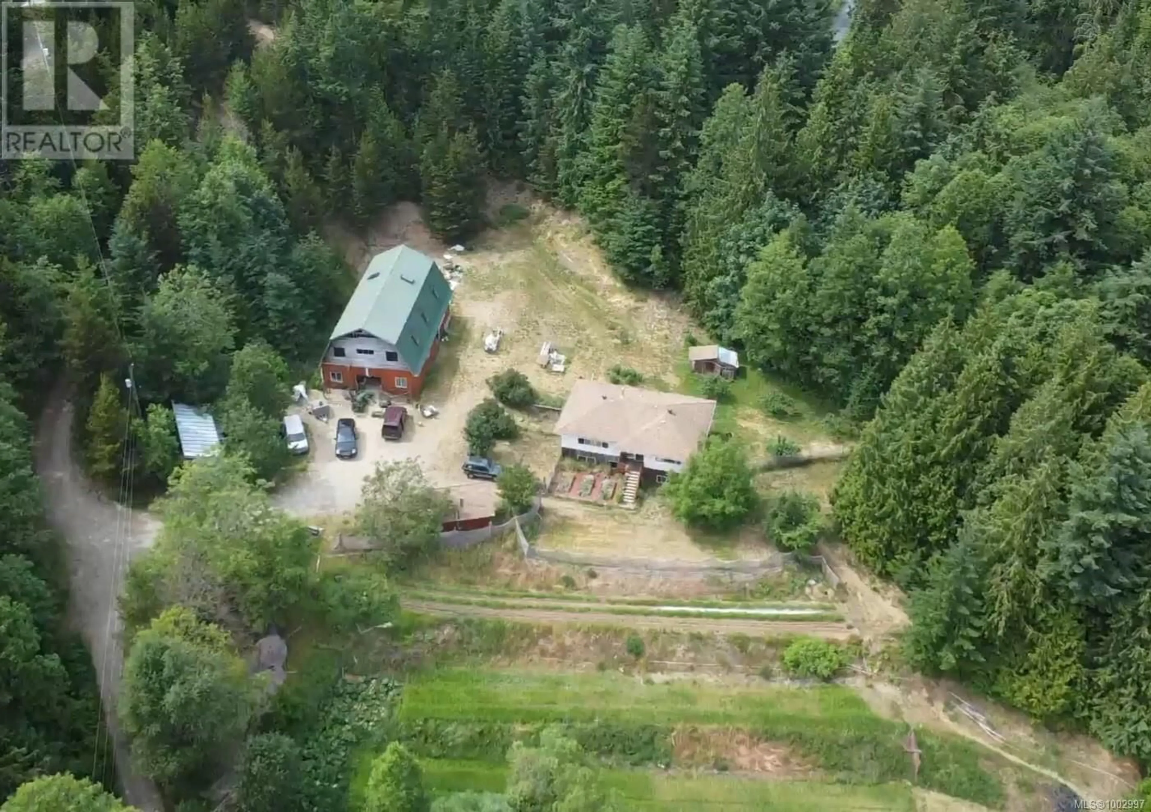 A pic from outside/outdoor area/front of a property/back of a property/a pic from drone, forest/trees view for 1075 SPIDER LAKE ROAD, Qualicum Beach British Columbia V9K2L7
