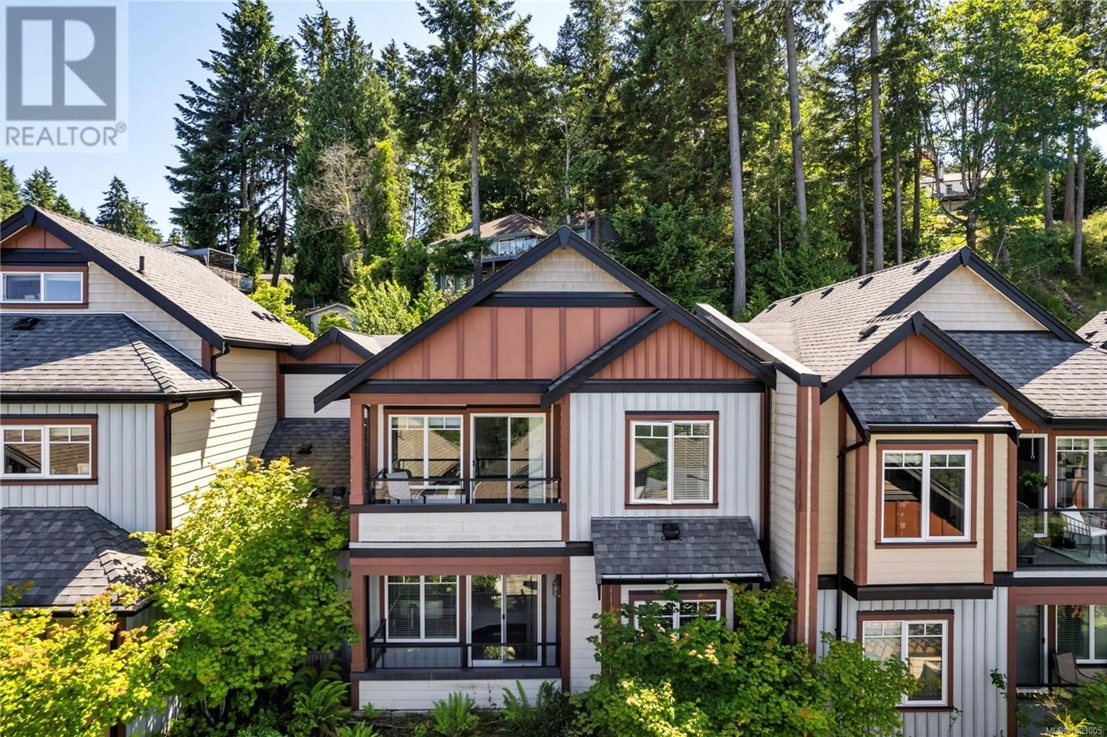 A pic from outside/outdoor area/front of a property/back of a property/a pic from drone, forest/trees view for 106 - 4745 GRANDVIEW COURT, Nanaimo British Columbia V9T0C1