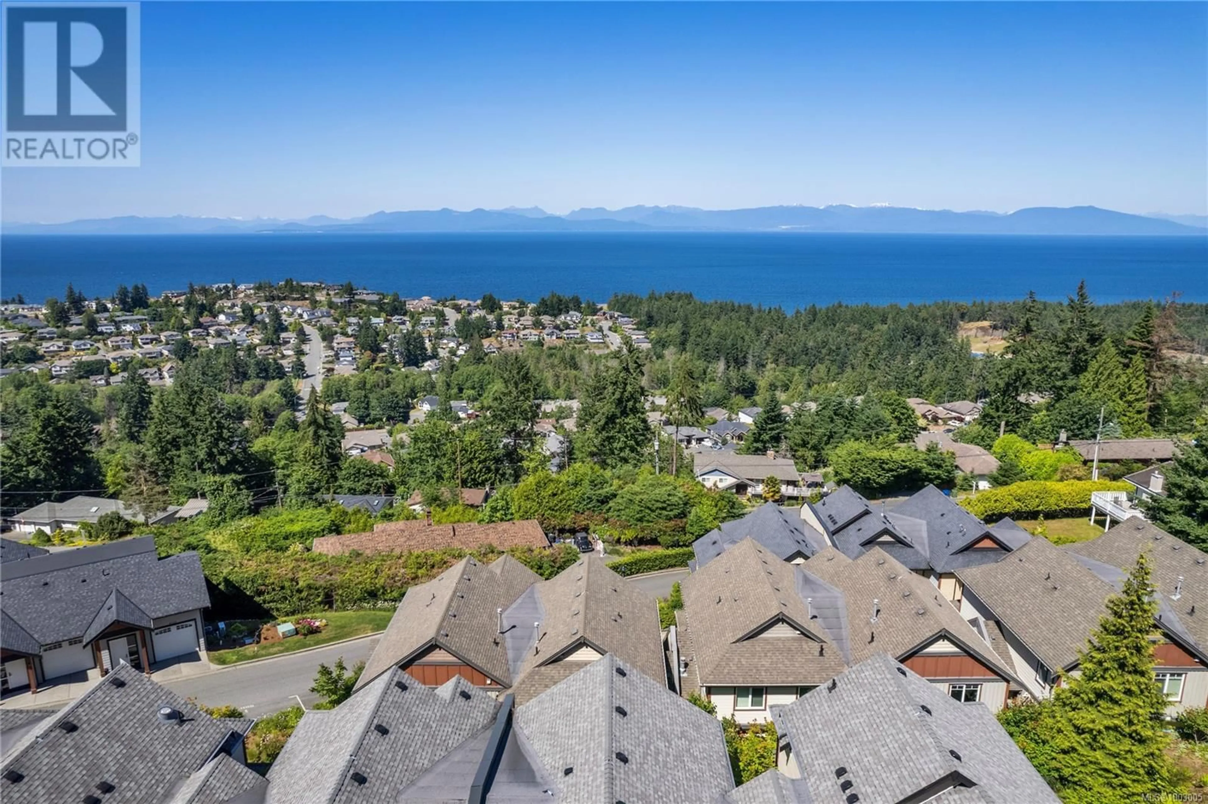 A pic from outside/outdoor area/front of a property/back of a property/a pic from drone, water/lake/river/ocean view for 106 - 4745 GRANDVIEW COURT, Nanaimo British Columbia V9T0C1