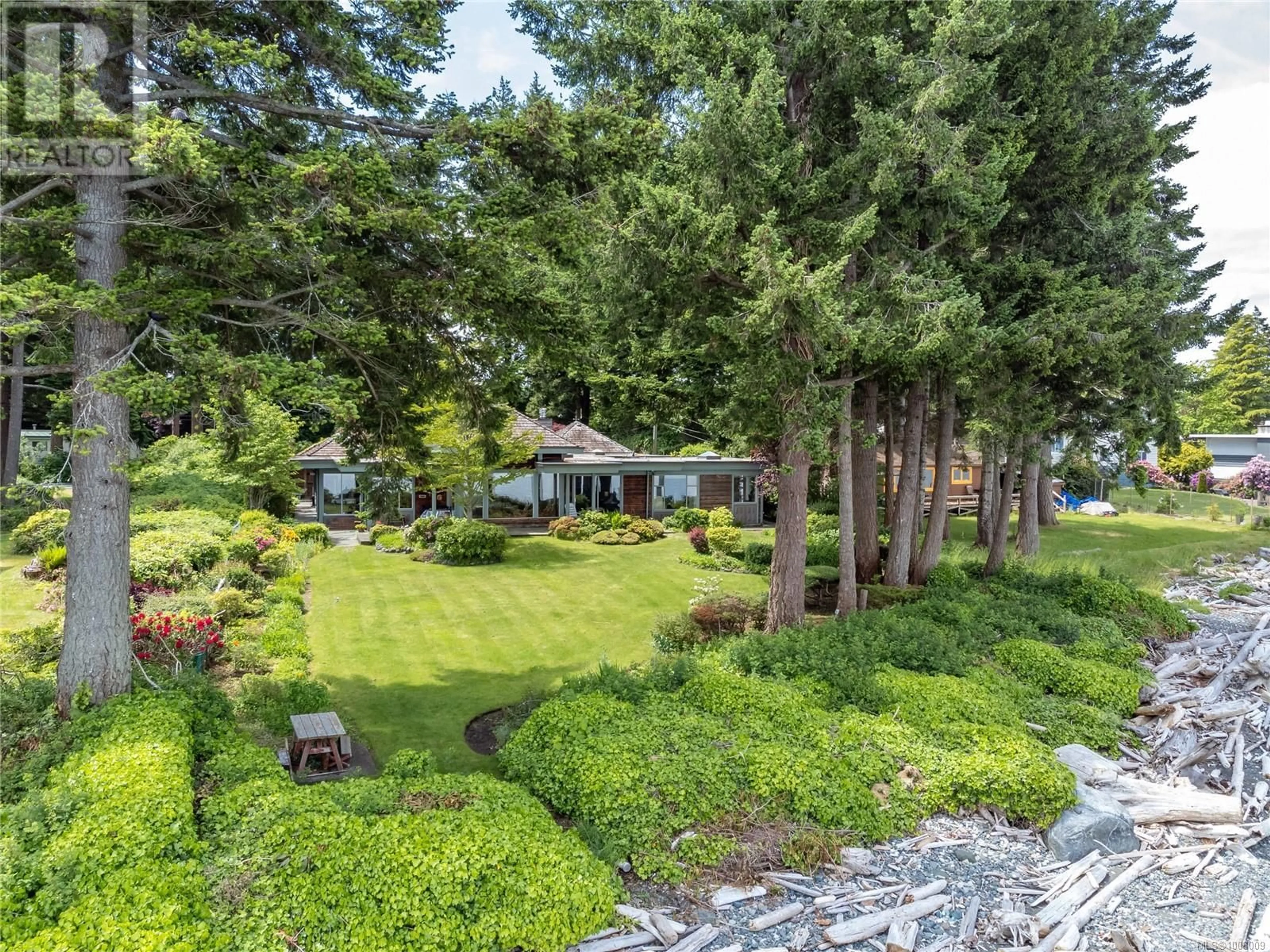 A pic from outside/outdoor area/front of a property/back of a property/a pic from drone, forest/trees view for 3675 OCEAN GROVE ROAD, Campbell River British Columbia V9W1E7