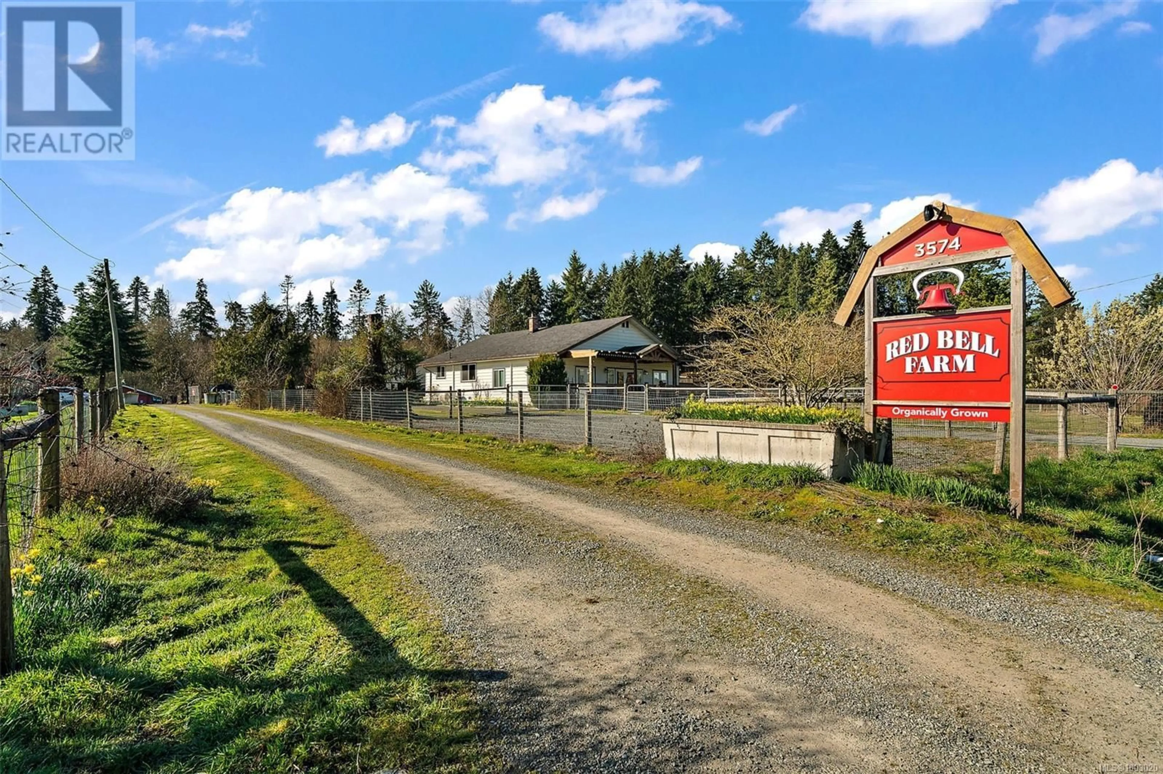 A pic from outside/outdoor area/front of a property/back of a property/a pic from drone, mountain view for 3574 COWICHAN LAKE ROAD, Duncan British Columbia V9L6K5