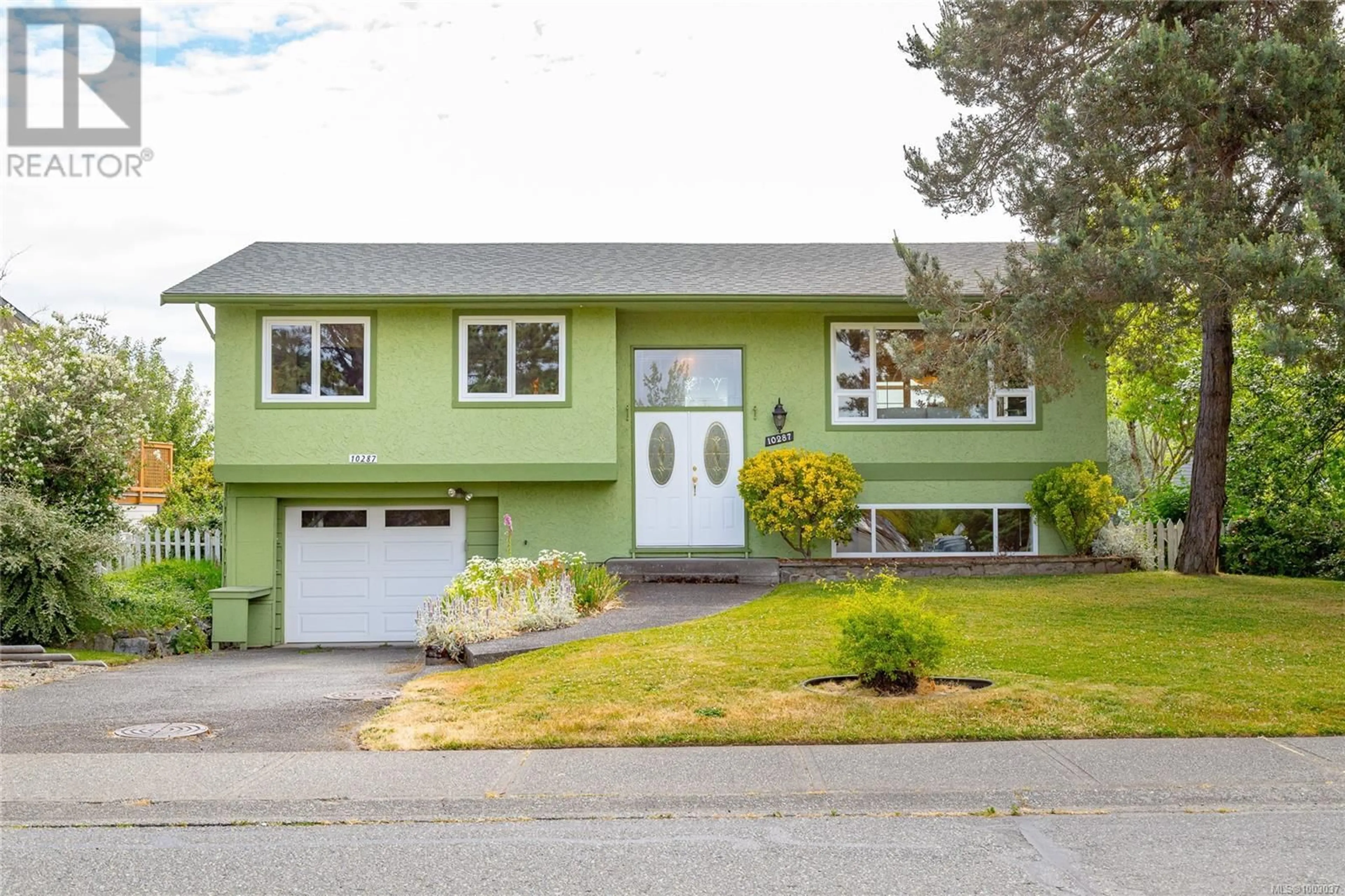 Home with vinyl exterior material, street for 10287 BOWERBANK ROAD, Sidney British Columbia V8L3L2
