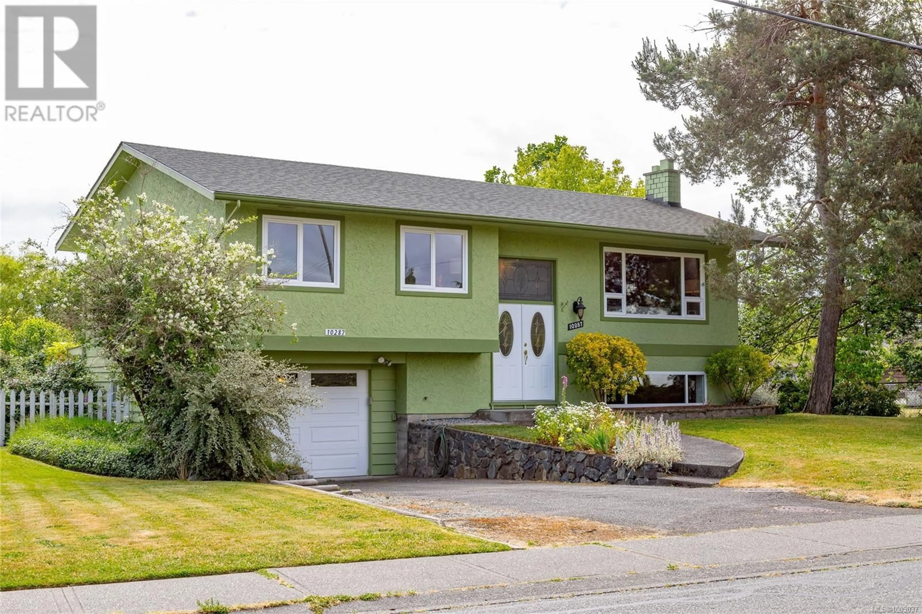 Home with vinyl exterior material, street for 10287 BOWERBANK ROAD, Sidney British Columbia V8L3L2