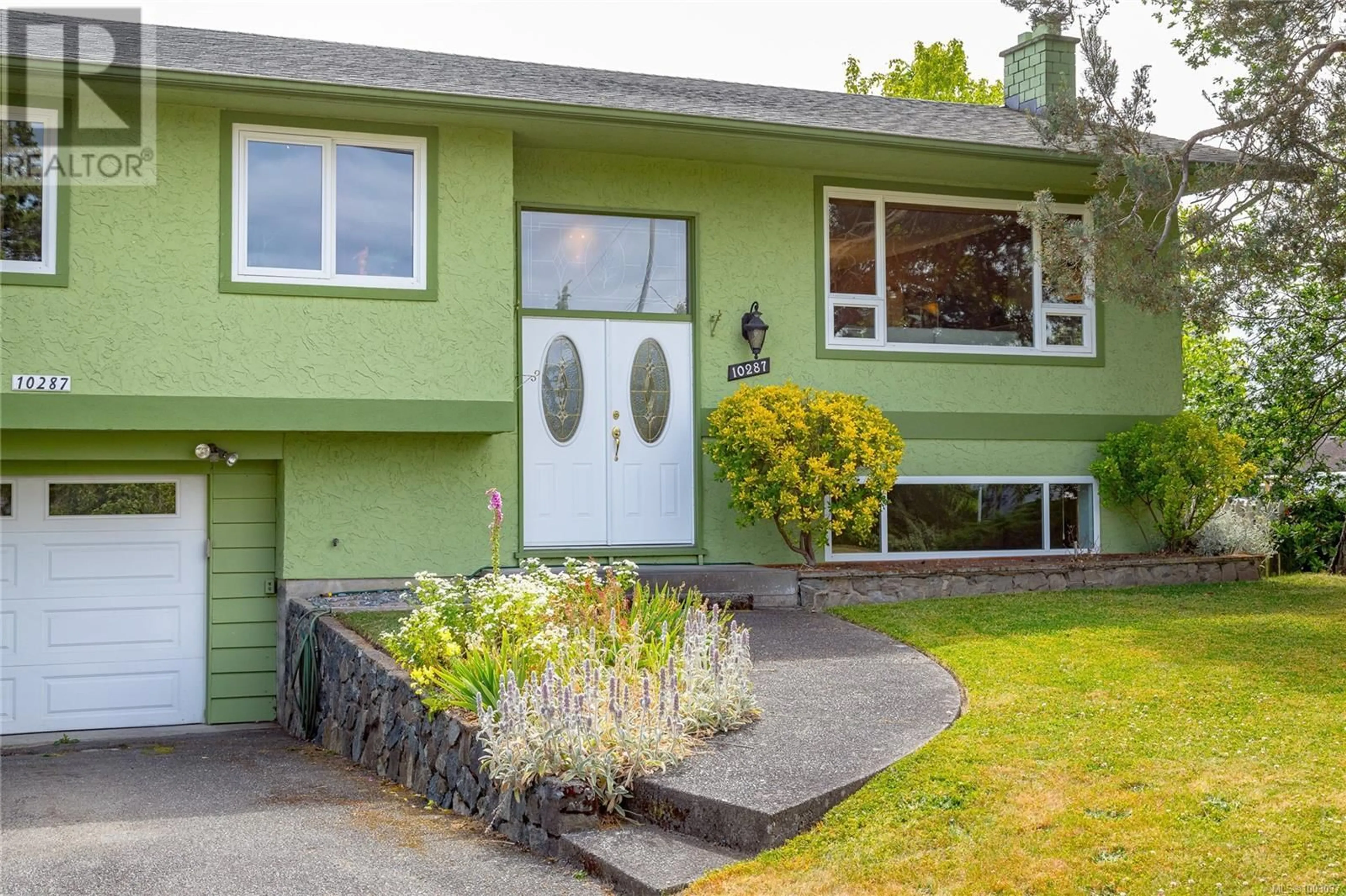 Home with vinyl exterior material, street for 10287 BOWERBANK ROAD, Sidney British Columbia V8L3L2