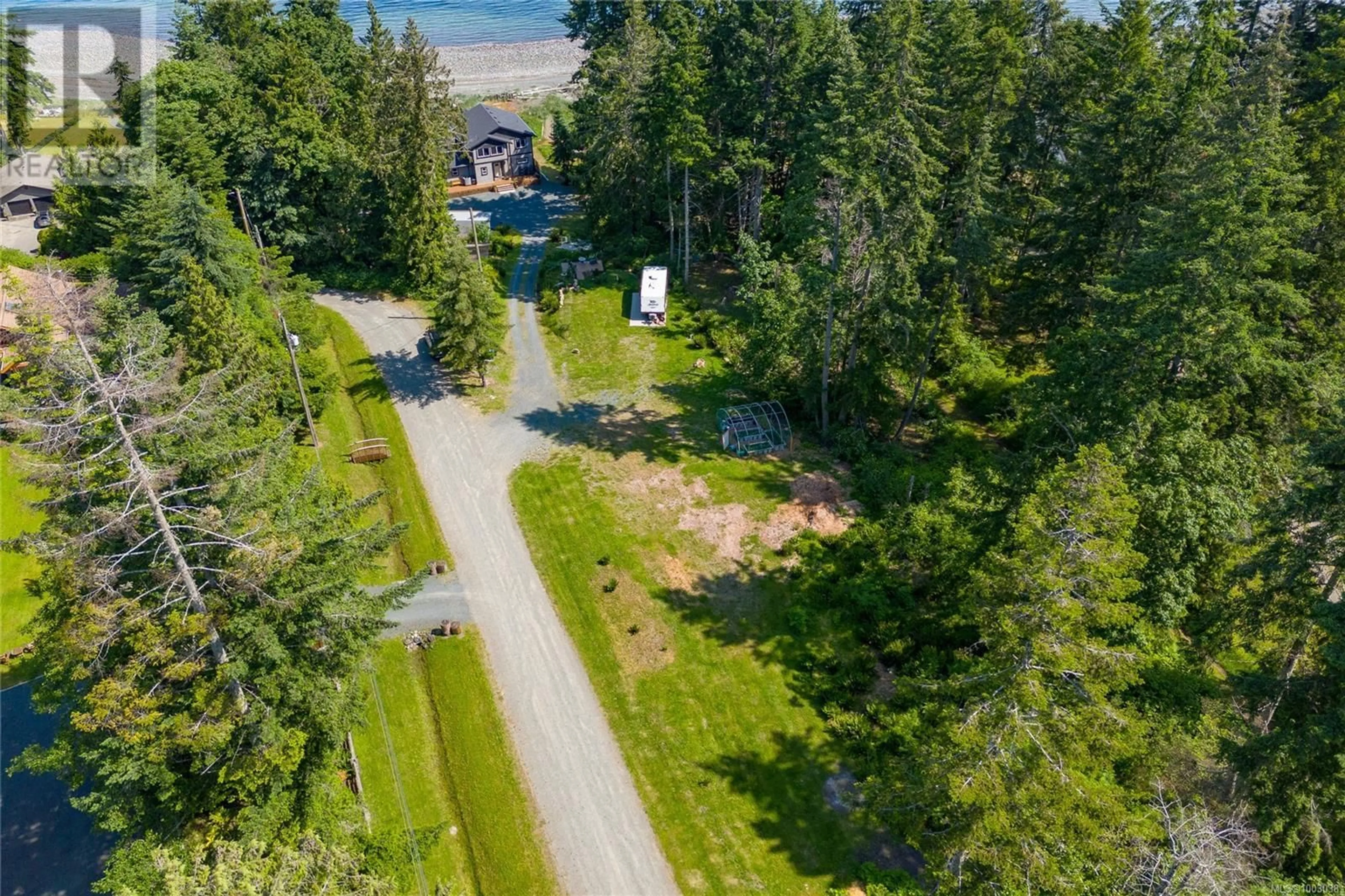 A pic from outside/outdoor area/front of a property/back of a property/a pic from drone, forest/trees view for 55 MIDLAND ROAD, Bowser British Columbia V0R1G0