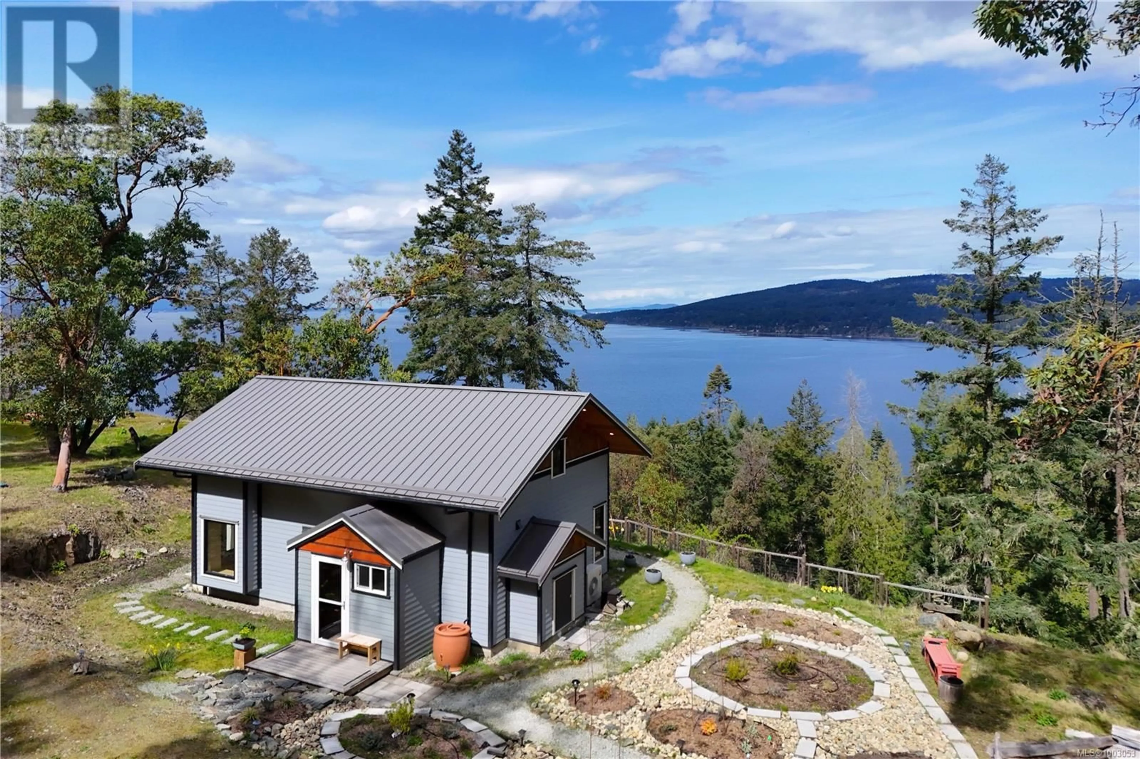 A pic from outside/outdoor area/front of a property/back of a property/a pic from drone, water/lake/river/ocean view for 115 NARROWS WEST ROAD, Salt Spring British Columbia V8K0A3