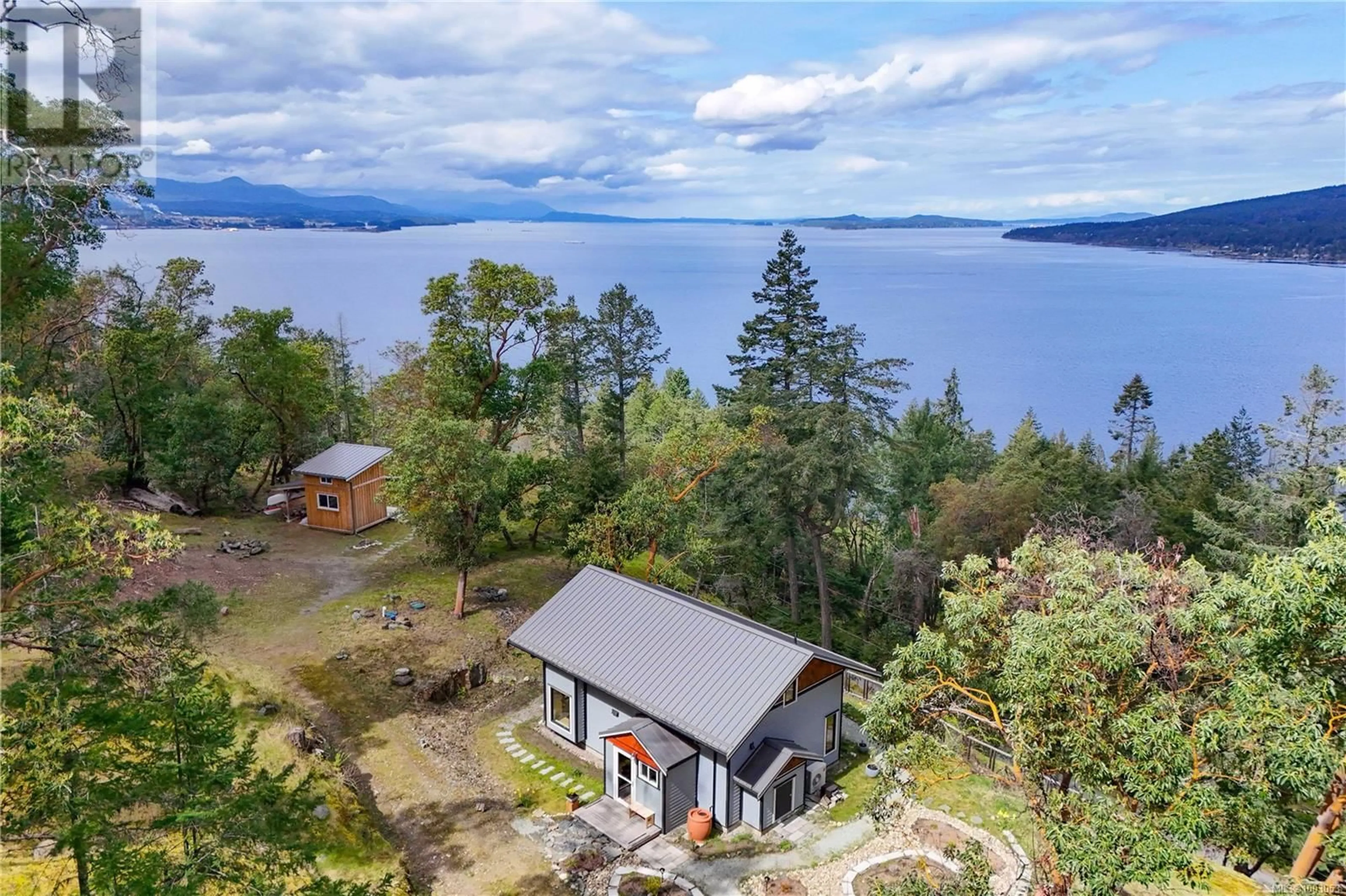 A pic from outside/outdoor area/front of a property/back of a property/a pic from drone, water/lake/river/ocean view for 115 NARROWS WEST ROAD, Salt Spring British Columbia V8K0A3