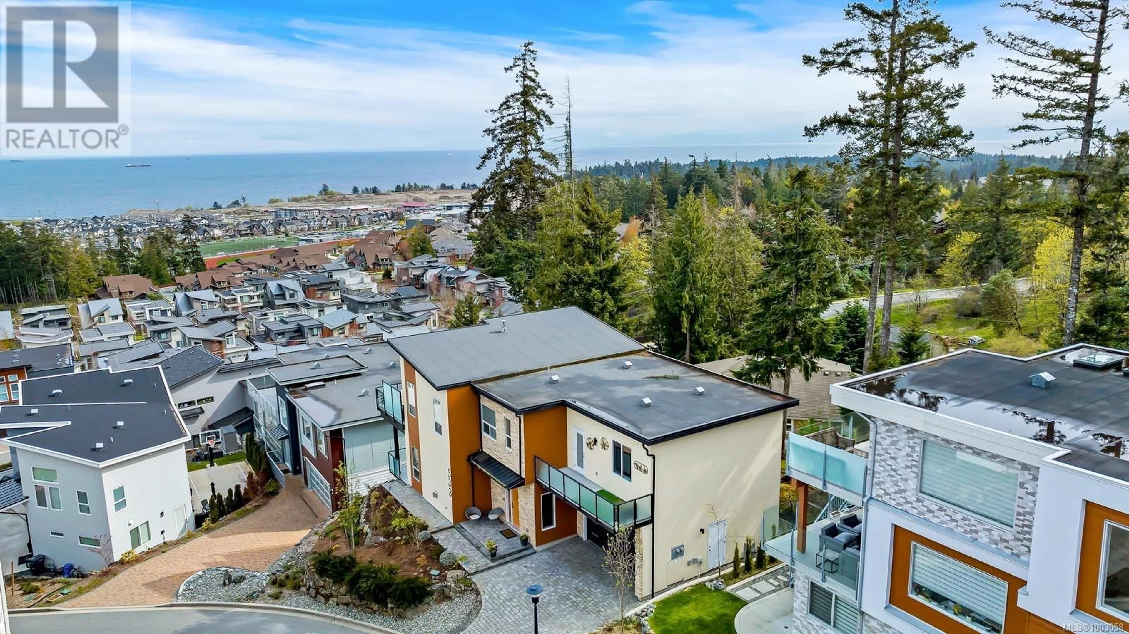 A pic from outside/outdoor area/front of a property/back of a property/a pic from drone, mountain view for 533 GURUNANK LANE, Colwood British Columbia V9C0M2