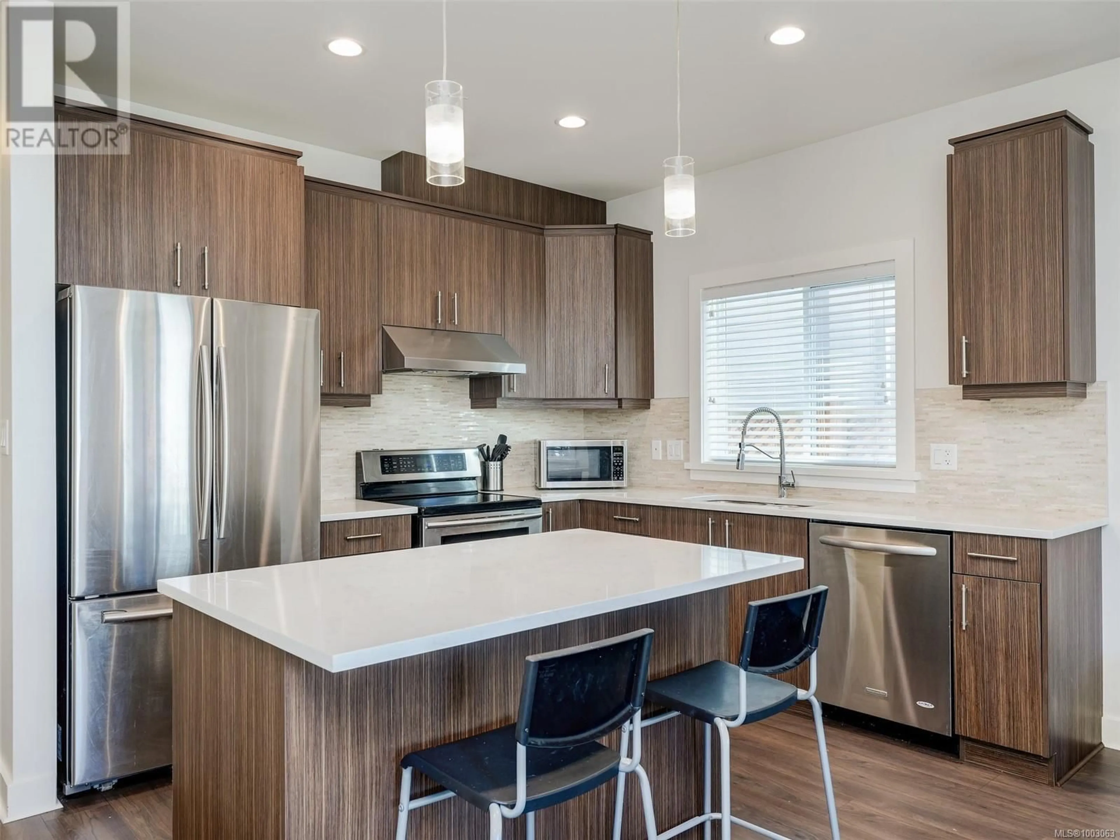 Contemporary kitchen, wood/laminate floor for 3329 PIPER ROAD, Langford British Columbia V9C0H3