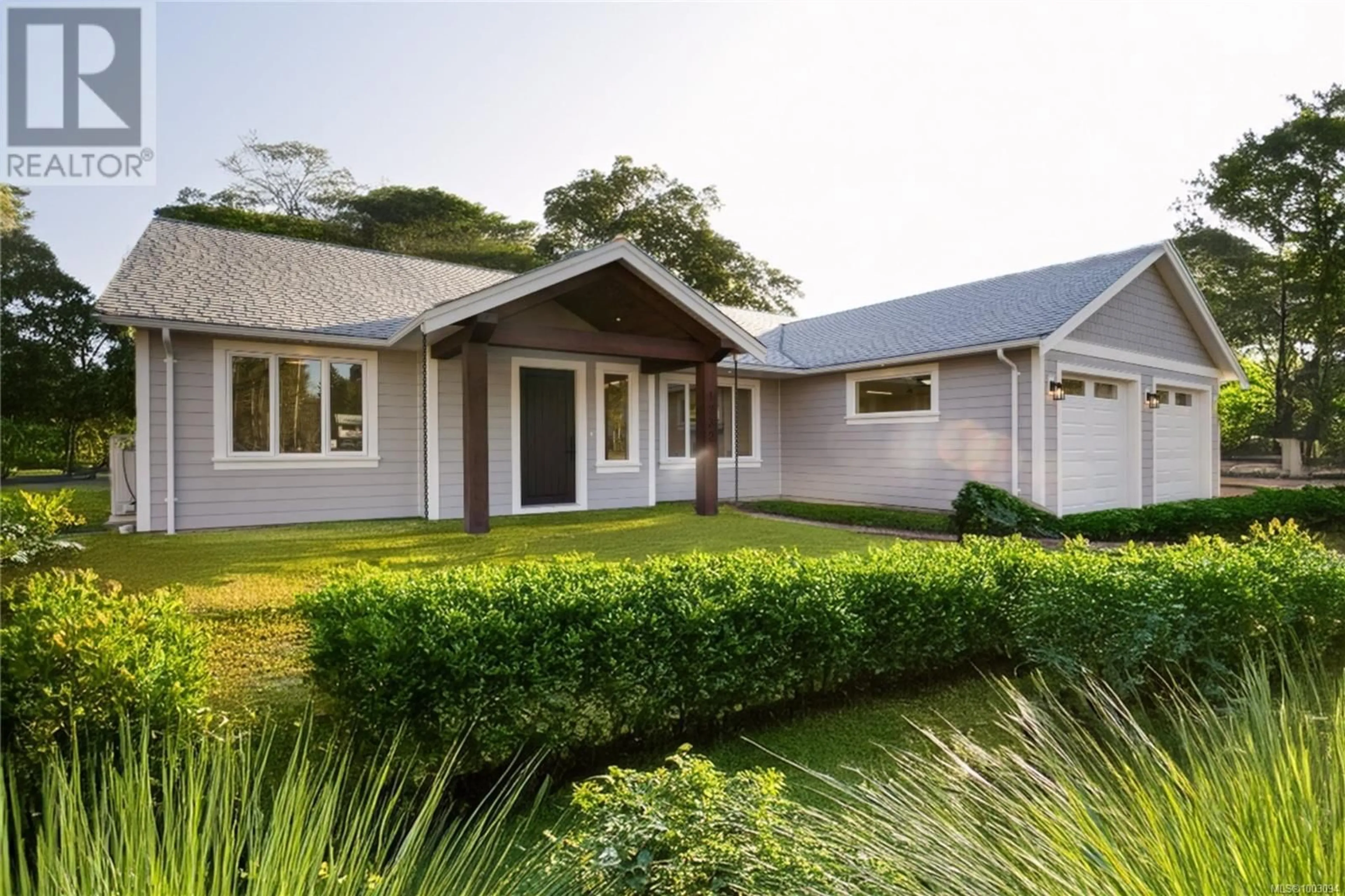 Home with vinyl exterior material, street for STATION ROAD, Coombs British Columbia V0R1M0