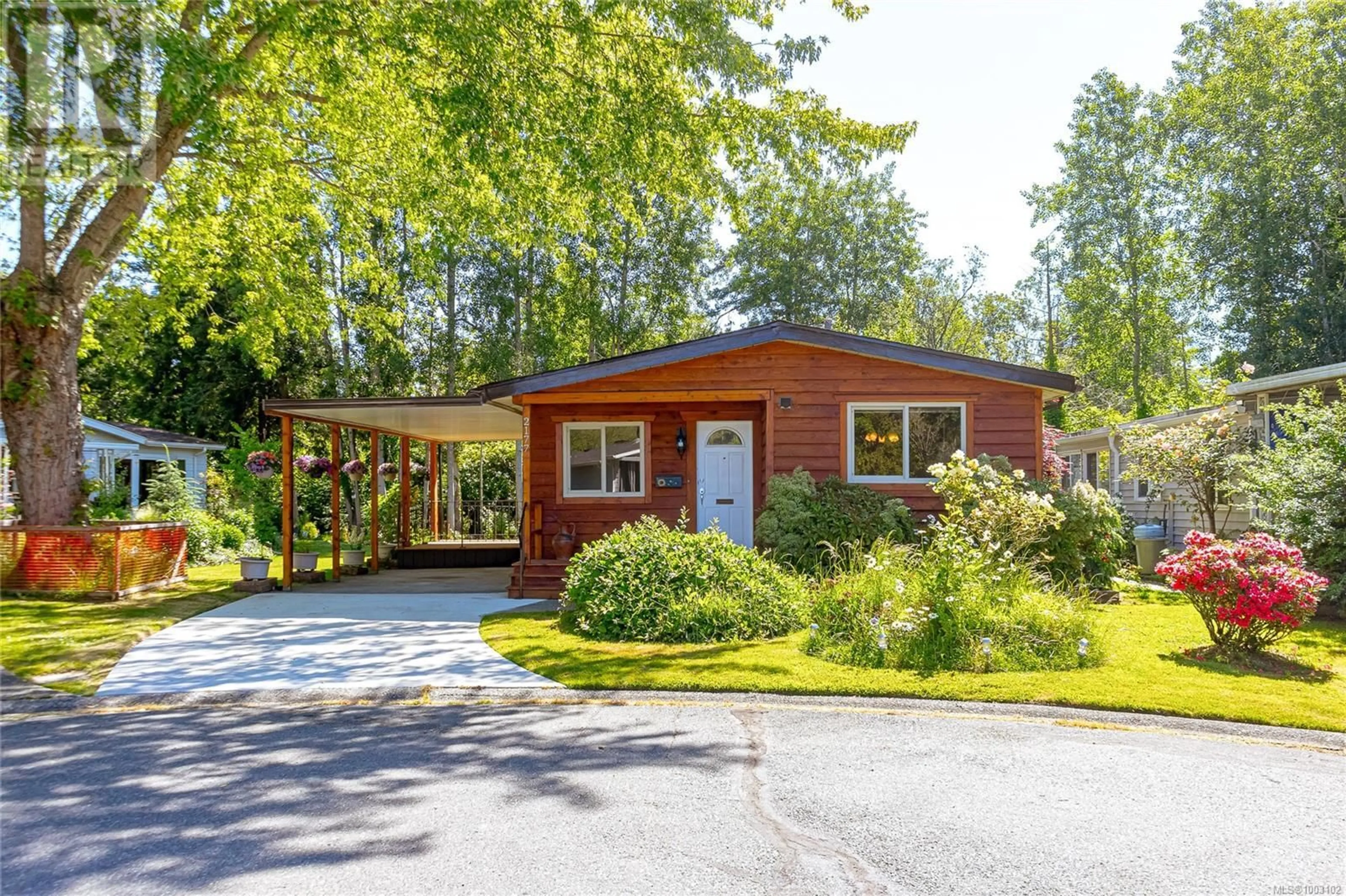 Home with vinyl exterior material, street for 2177 SUMMERGATE BOULEVARD, Sidney British Columbia V8L4K9