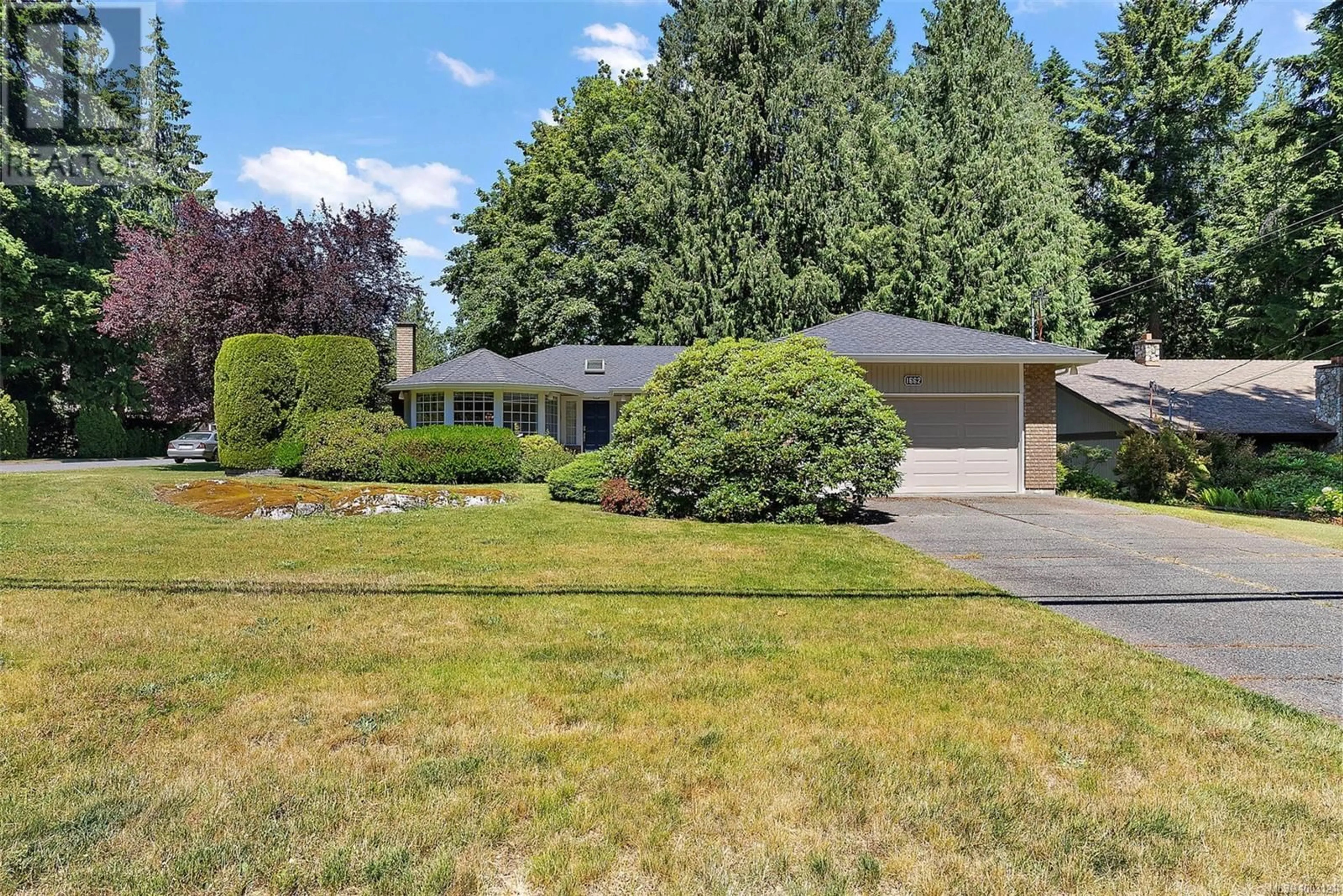 Home with vinyl exterior material, street for 1662 DEAN PARK ROAD, North Saanich British Columbia V8L4Y7
