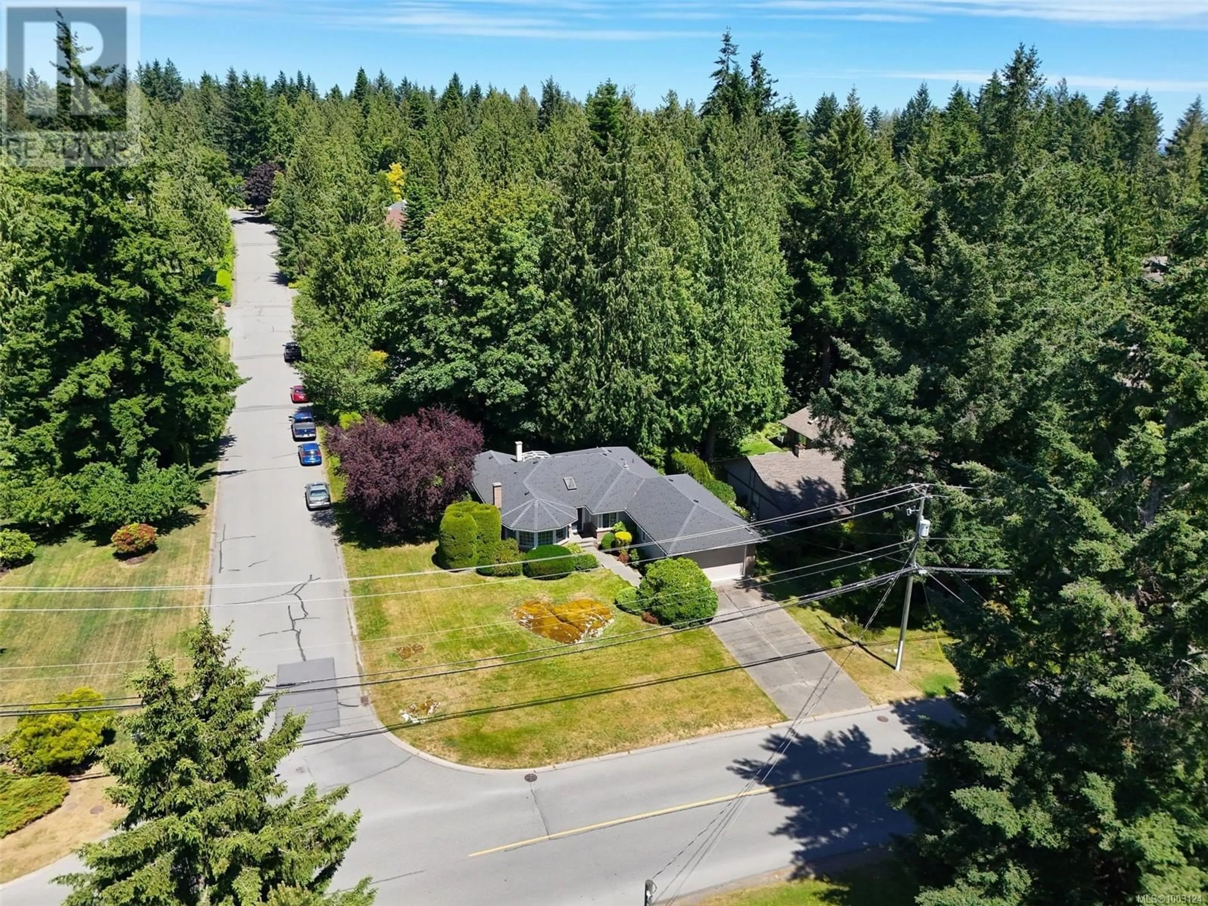 A pic from outside/outdoor area/front of a property/back of a property/a pic from drone, forest/trees view for 1662 DEAN PARK ROAD, North Saanich British Columbia V8L4Y7
