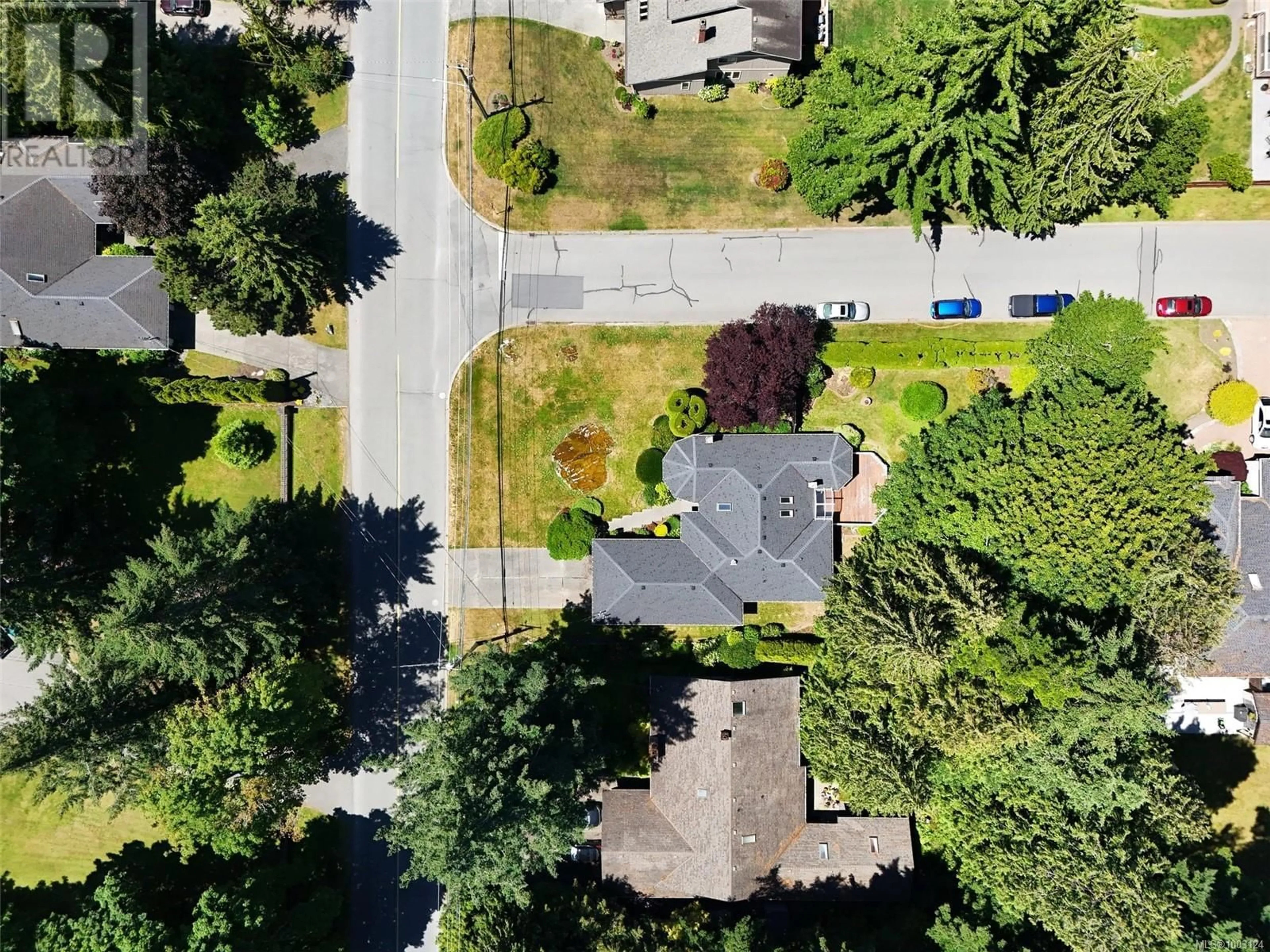A pic from outside/outdoor area/front of a property/back of a property/a pic from drone, street for 1662 DEAN PARK ROAD, North Saanich British Columbia V8L4Y7