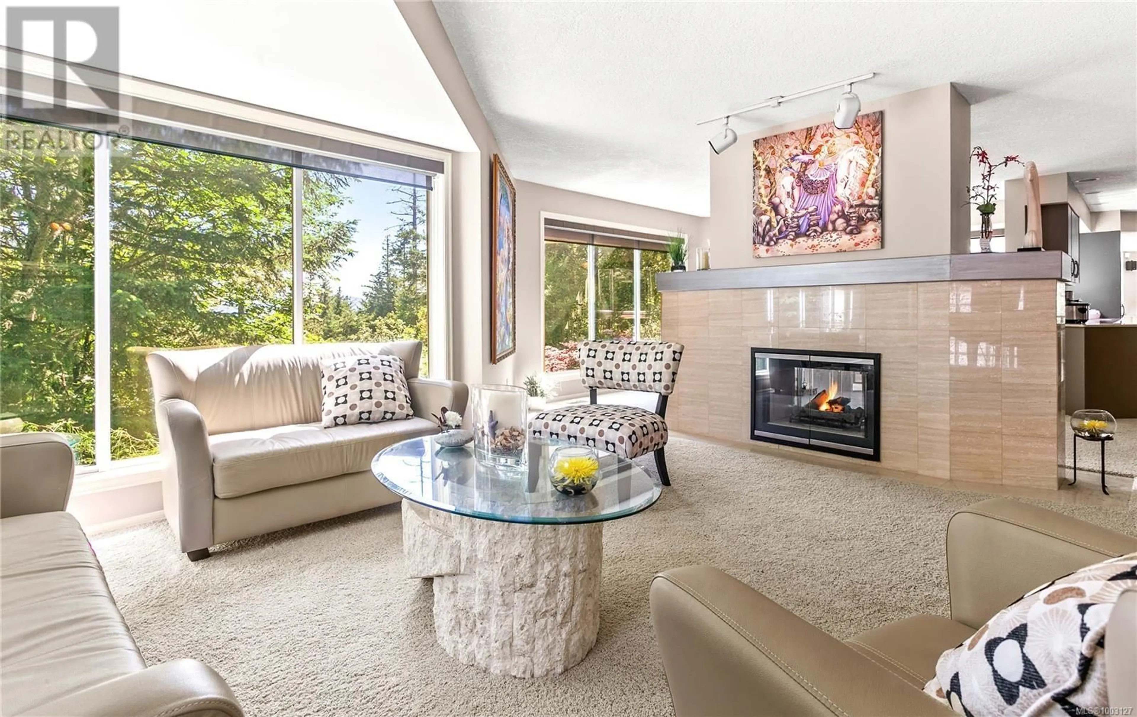 Living room with furniture, ceramic/tile floor for 8152 WOODWYN TERRACE, Central Saanich British Columbia V8M1S2