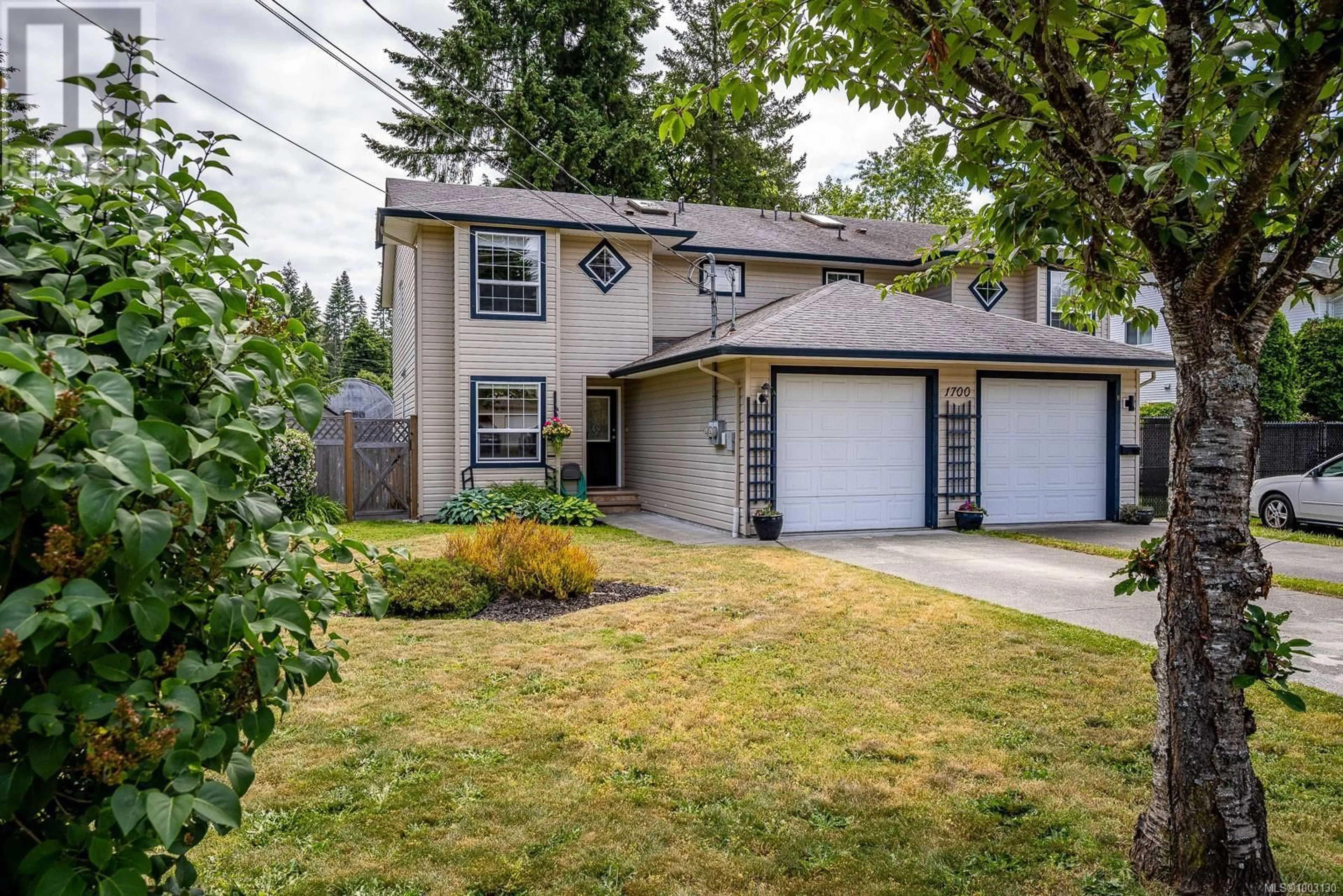 Home with vinyl exterior material, street for A - 1700 1ST STREET, Courtenay British Columbia V9N6V5