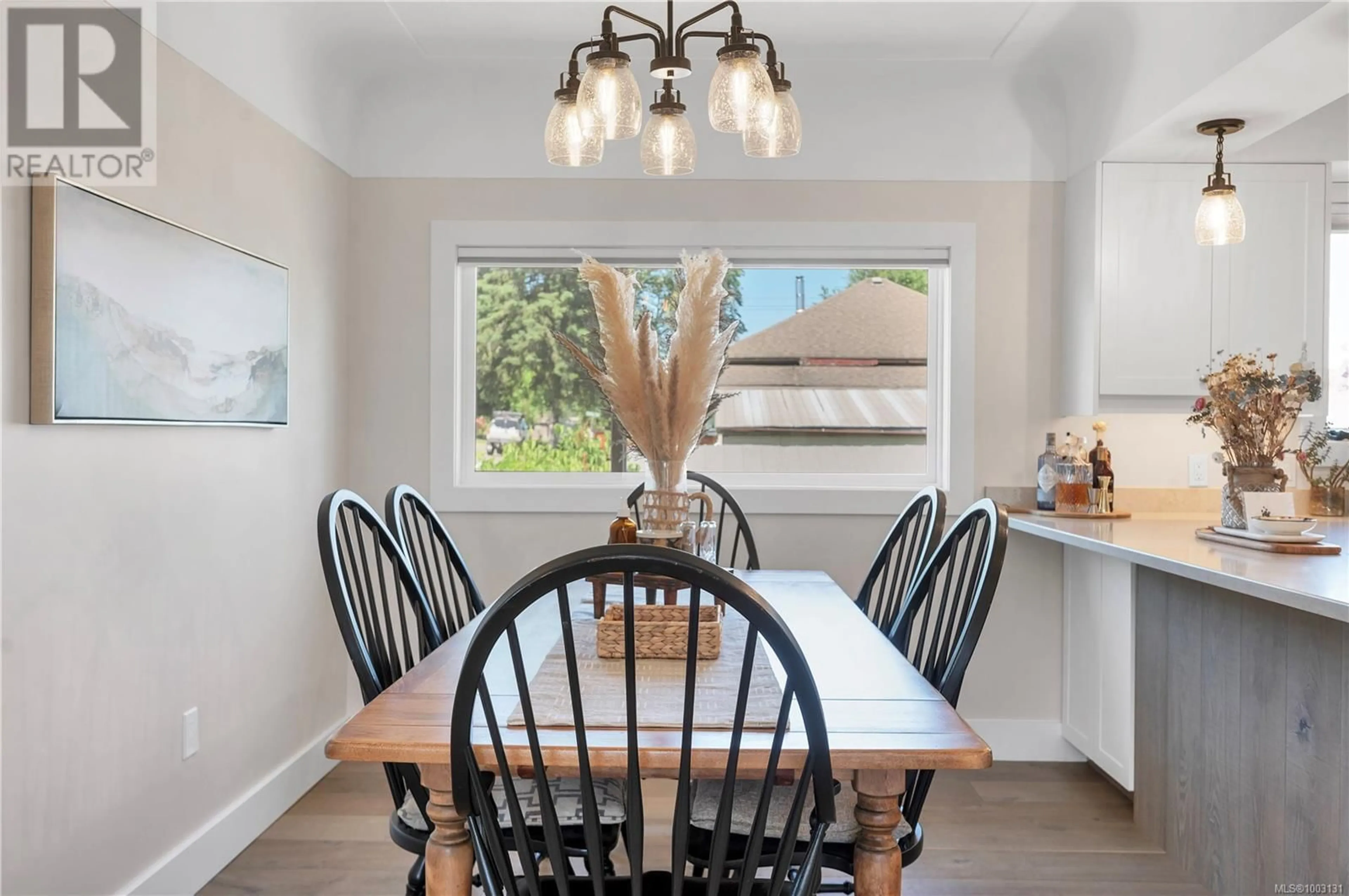 Dining room, wood/laminate floor for 3268 SIXTH STREET, Cumberland British Columbia V0R1S0