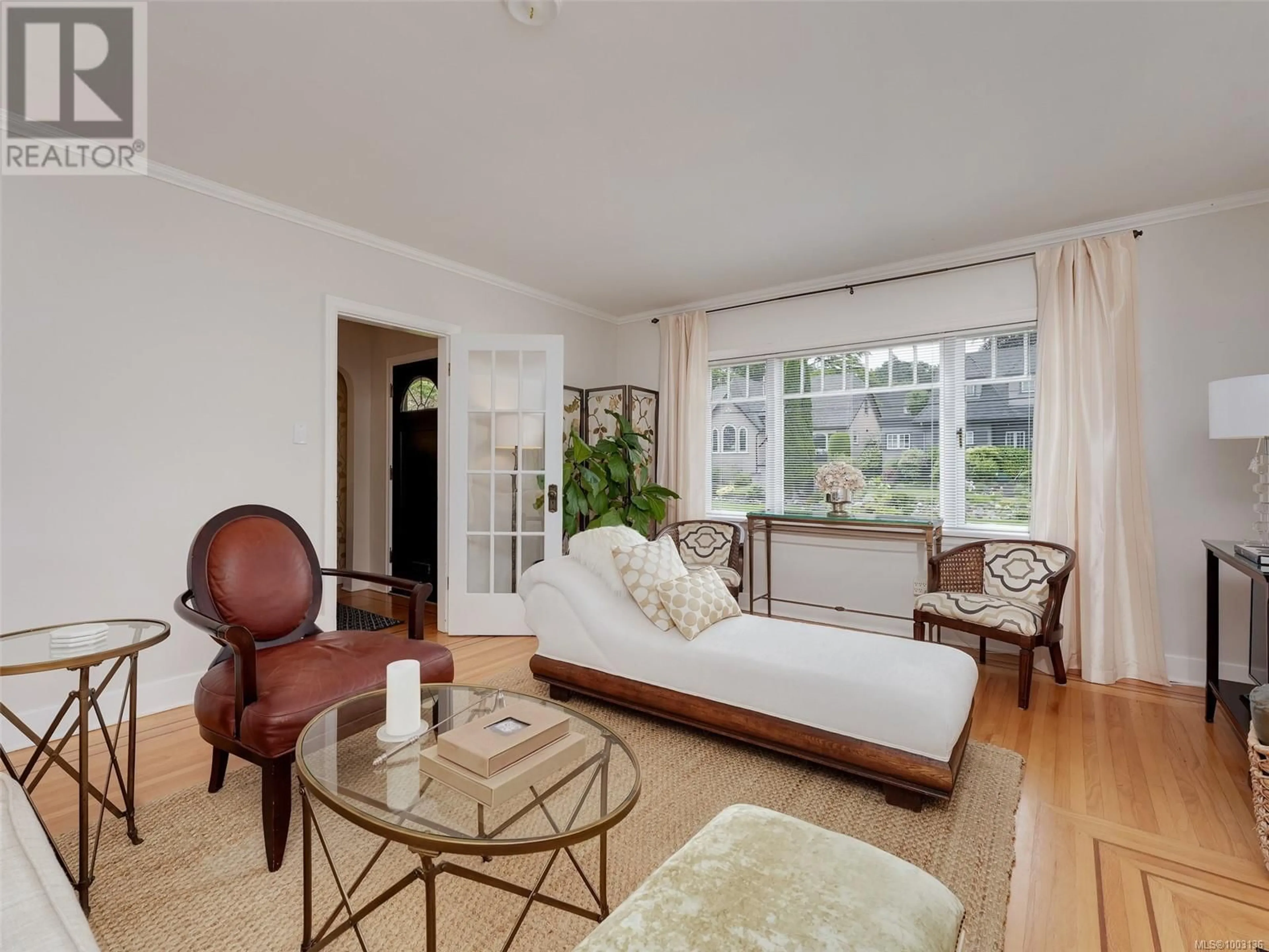 Living room with furniture, wood/laminate floor for 2488 CENTRAL AVENUE, Oak Bay British Columbia V8S2S8