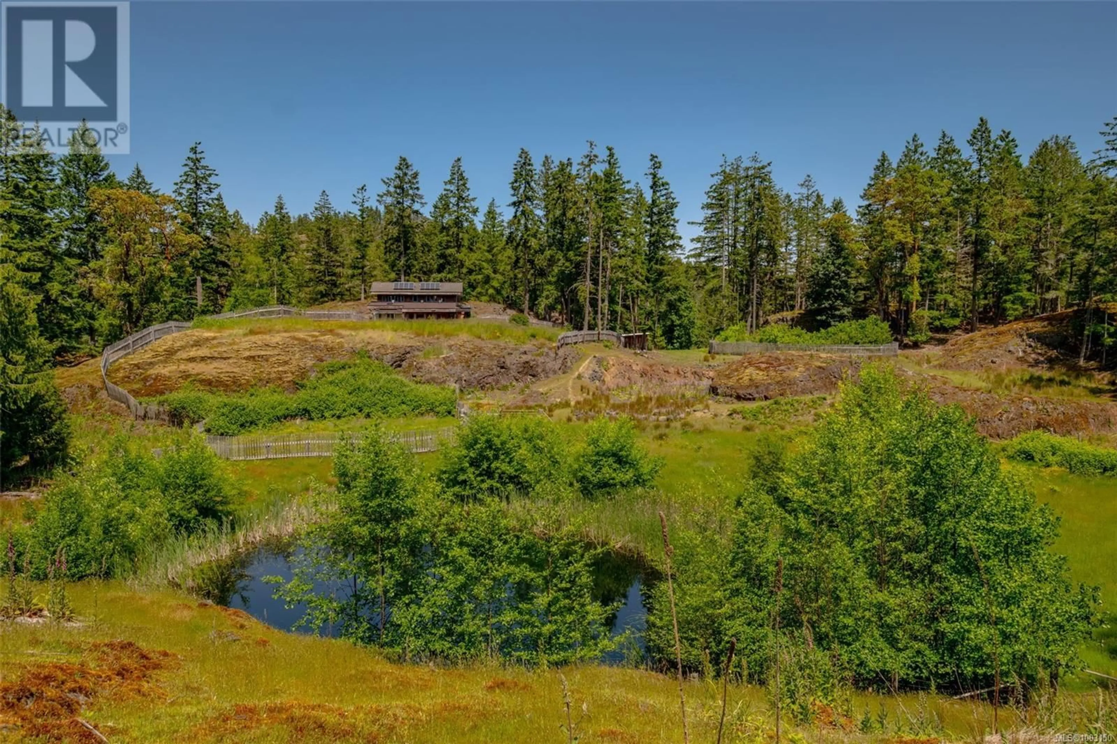 A pic from outside/outdoor area/front of a property/back of a property/a pic from drone, water/lake/river/ocean view for 9 MAIN ROAD, Lasqueti Island British Columbia V0R2J0