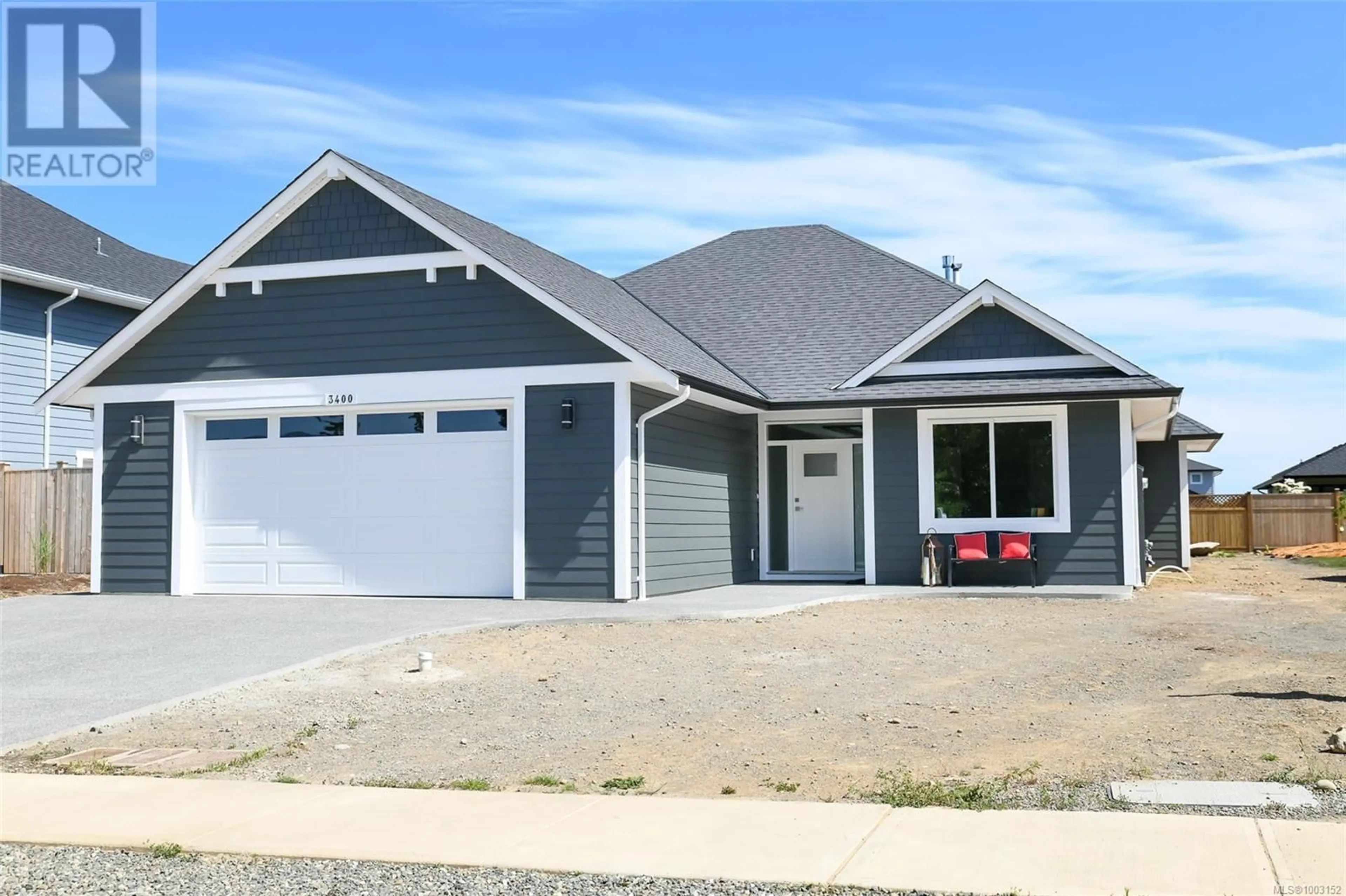Home with vinyl exterior material, street for 3400 RHYS ROAD, Courtenay British Columbia V9N0B7
