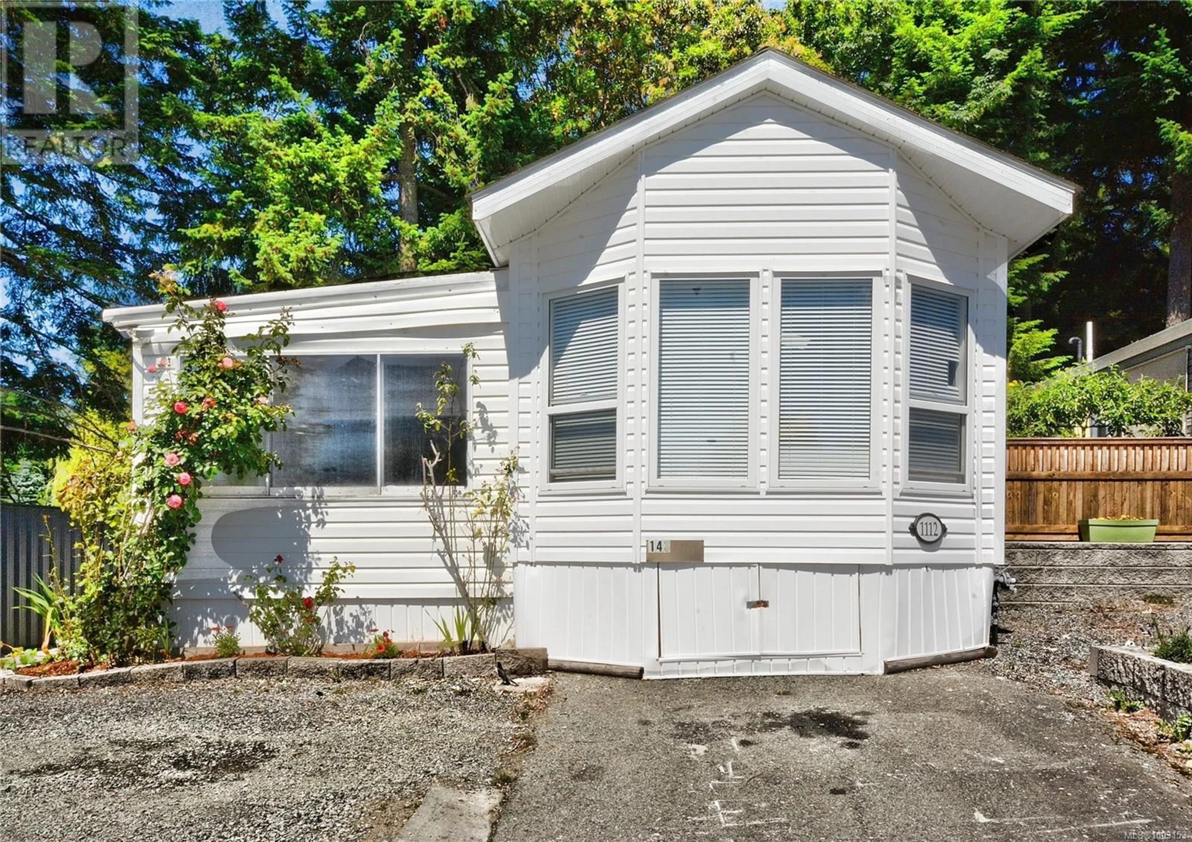Home with vinyl exterior material, street for 143 - 1112 WOSS LAKE DRIVE, Nanaimo British Columbia V9R6X7