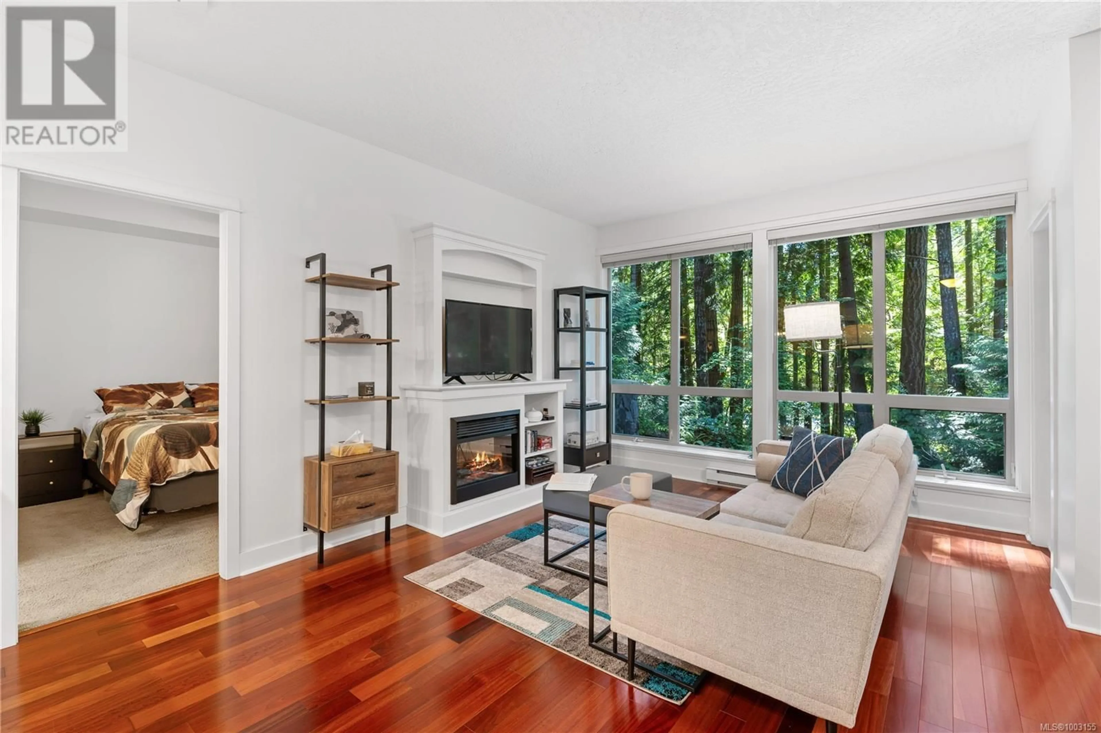 Living room with furniture, wood/laminate floor for 106 - 631 BROOKSIDE ROAD, Colwood British Columbia V9C0C3