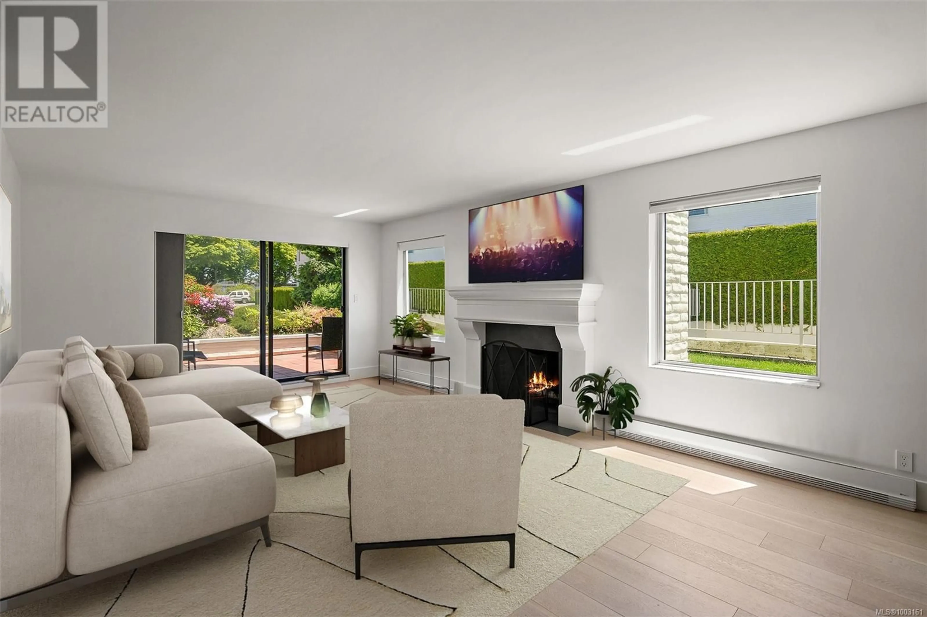 Living room with furniture, unknown for 109 - 1370 BEACH DRIVE, Oak Bay British Columbia V8S2N6