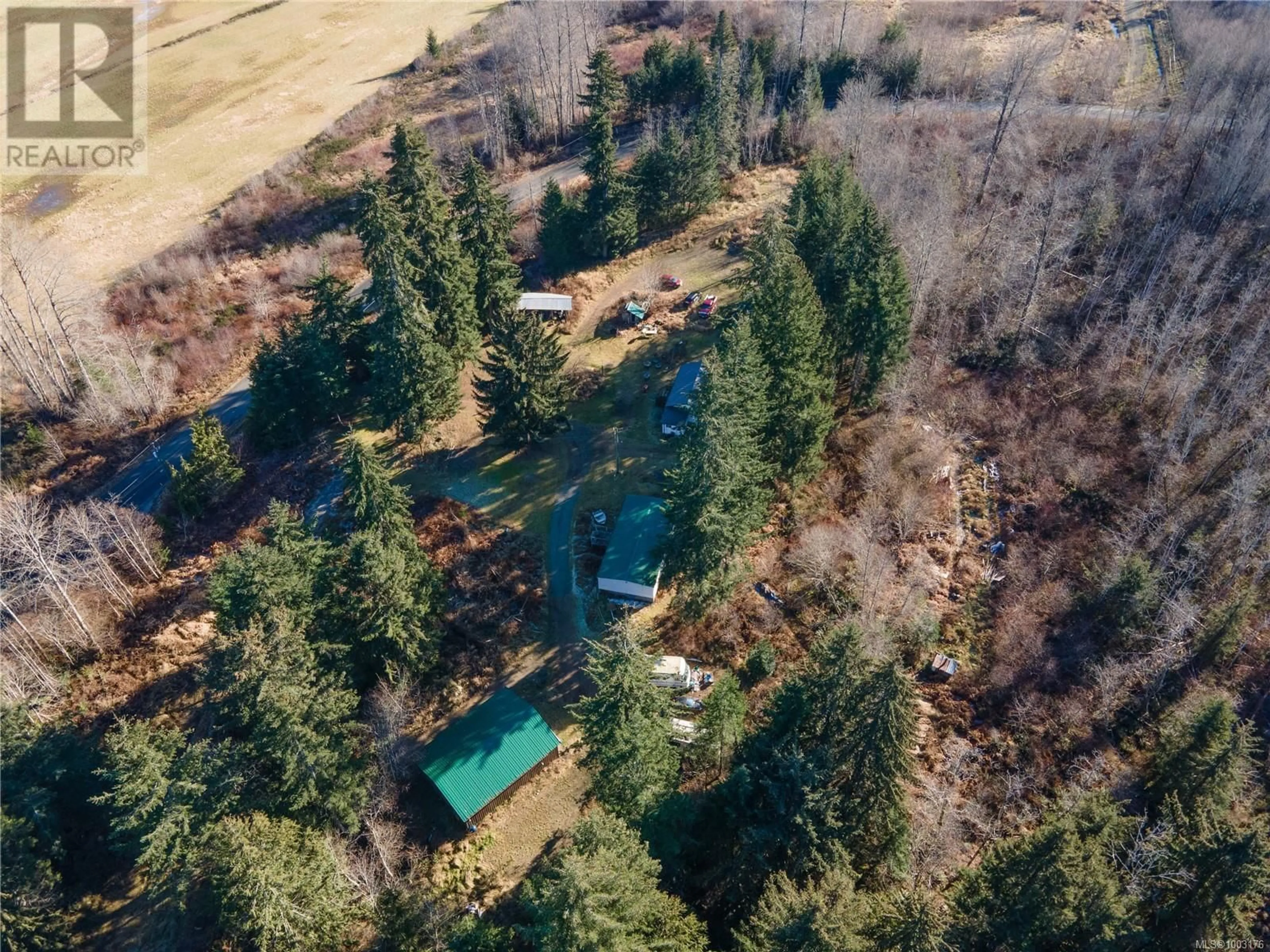 A pic from outside/outdoor area/front of a property/back of a property/a pic from drone, forest/trees view for 3666 MACAULAY ROAD, Oyster River British Columbia V9J1C7