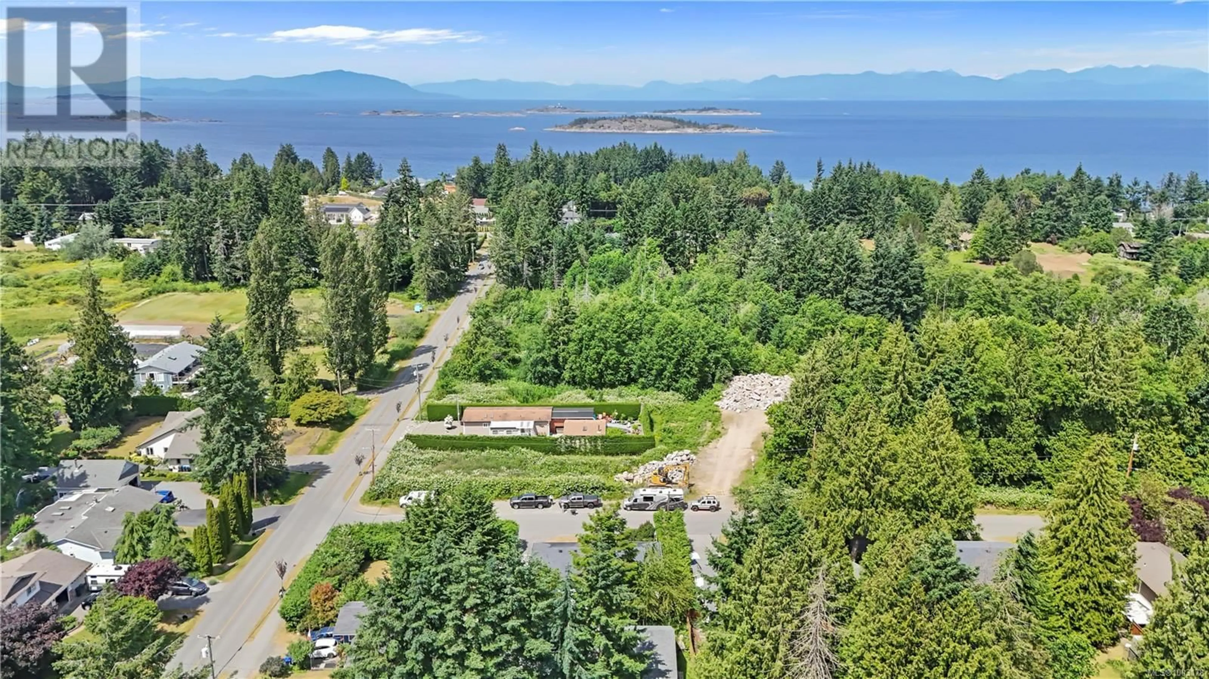 A pic from outside/outdoor area/front of a property/back of a property/a pic from drone, water/lake/river/ocean view for 7361 LYNN DRIVE, Lantzville British Columbia V0R2H0