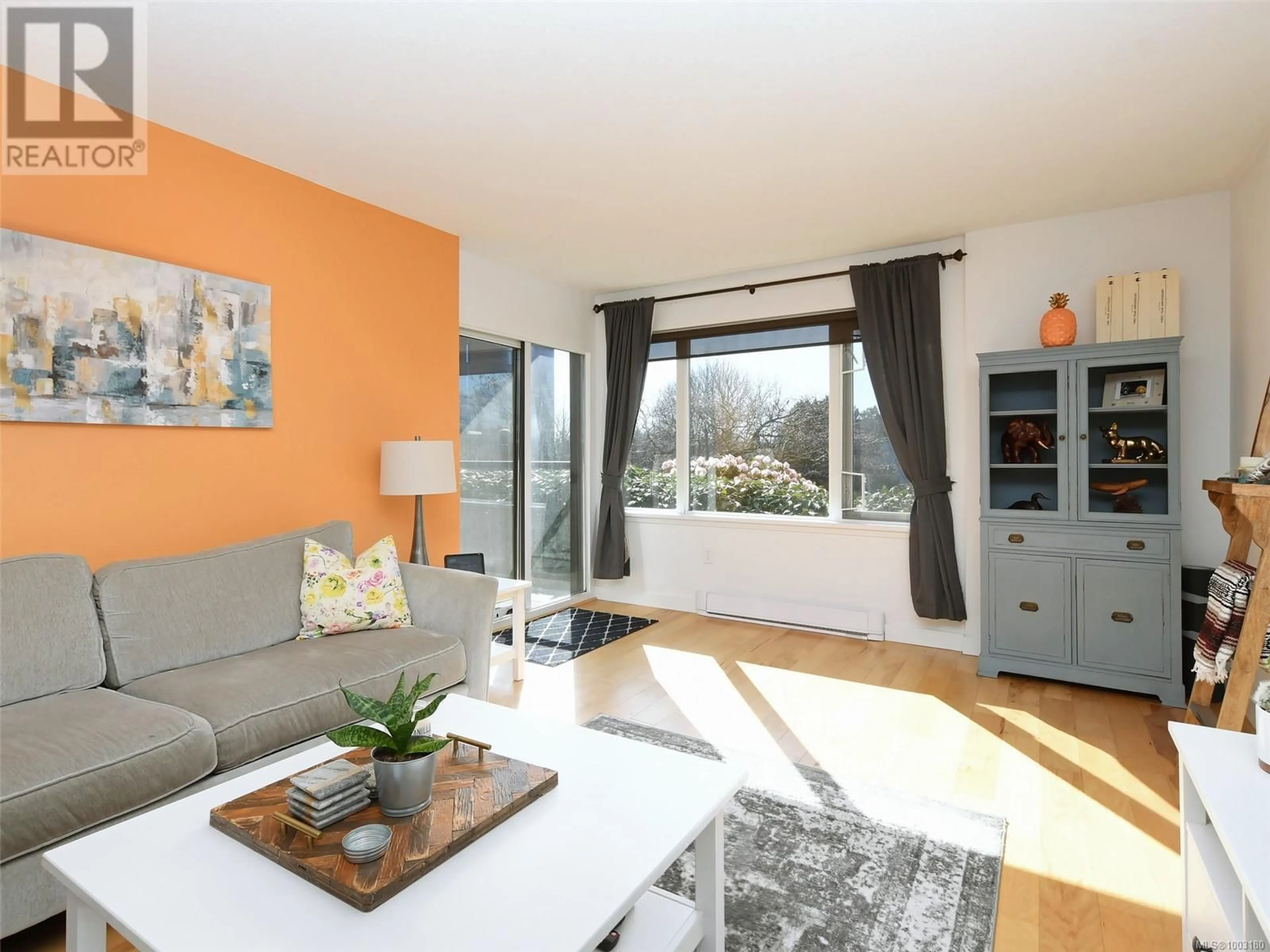 Living room with furniture, wood/laminate floor for 108 - 103 GORGE ROAD EAST, Victoria British Columbia V9Z6Z2