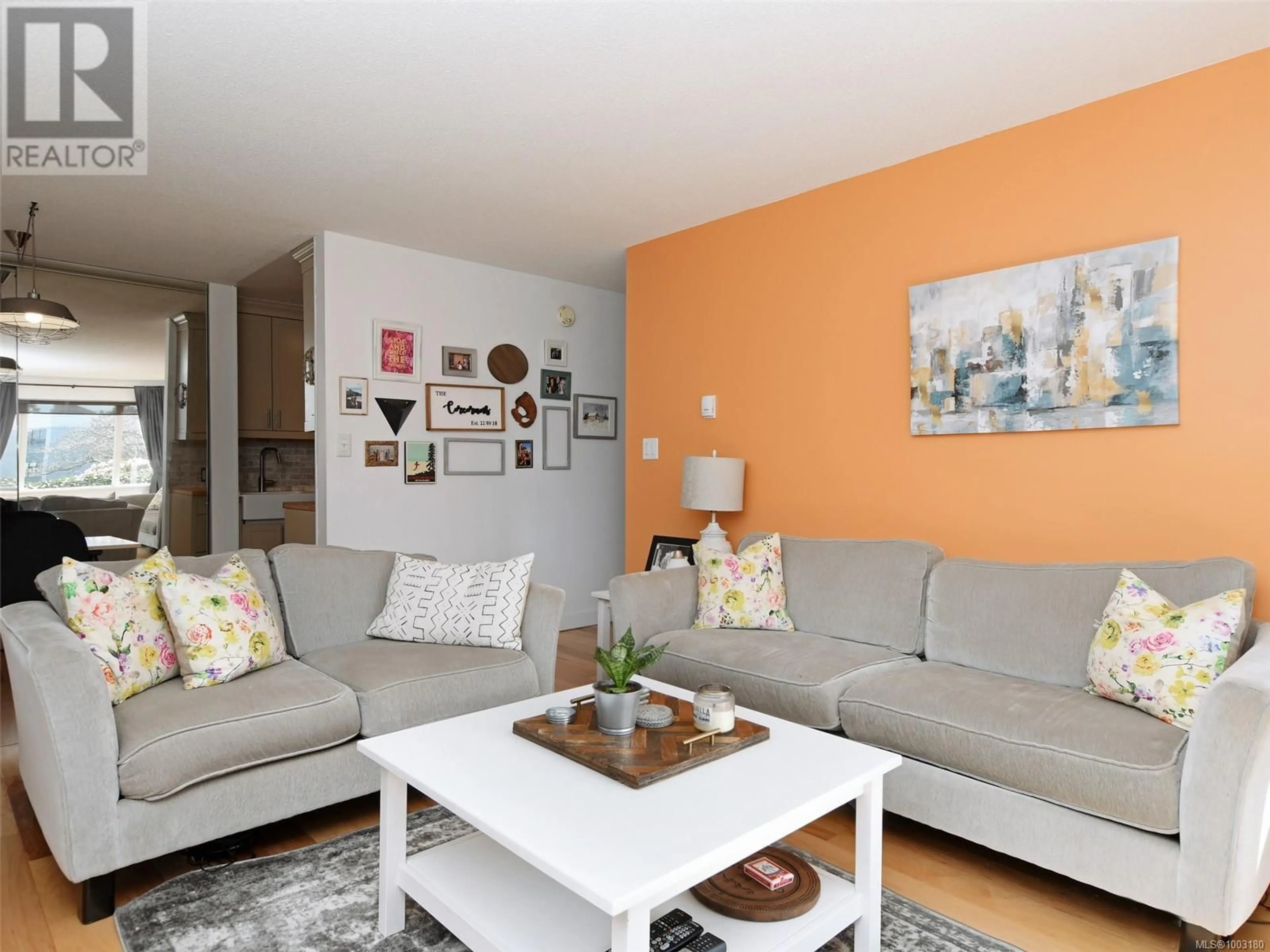 Living room with furniture, wood/laminate floor for 108 - 103 GORGE ROAD EAST, Victoria British Columbia V9Z6Z2