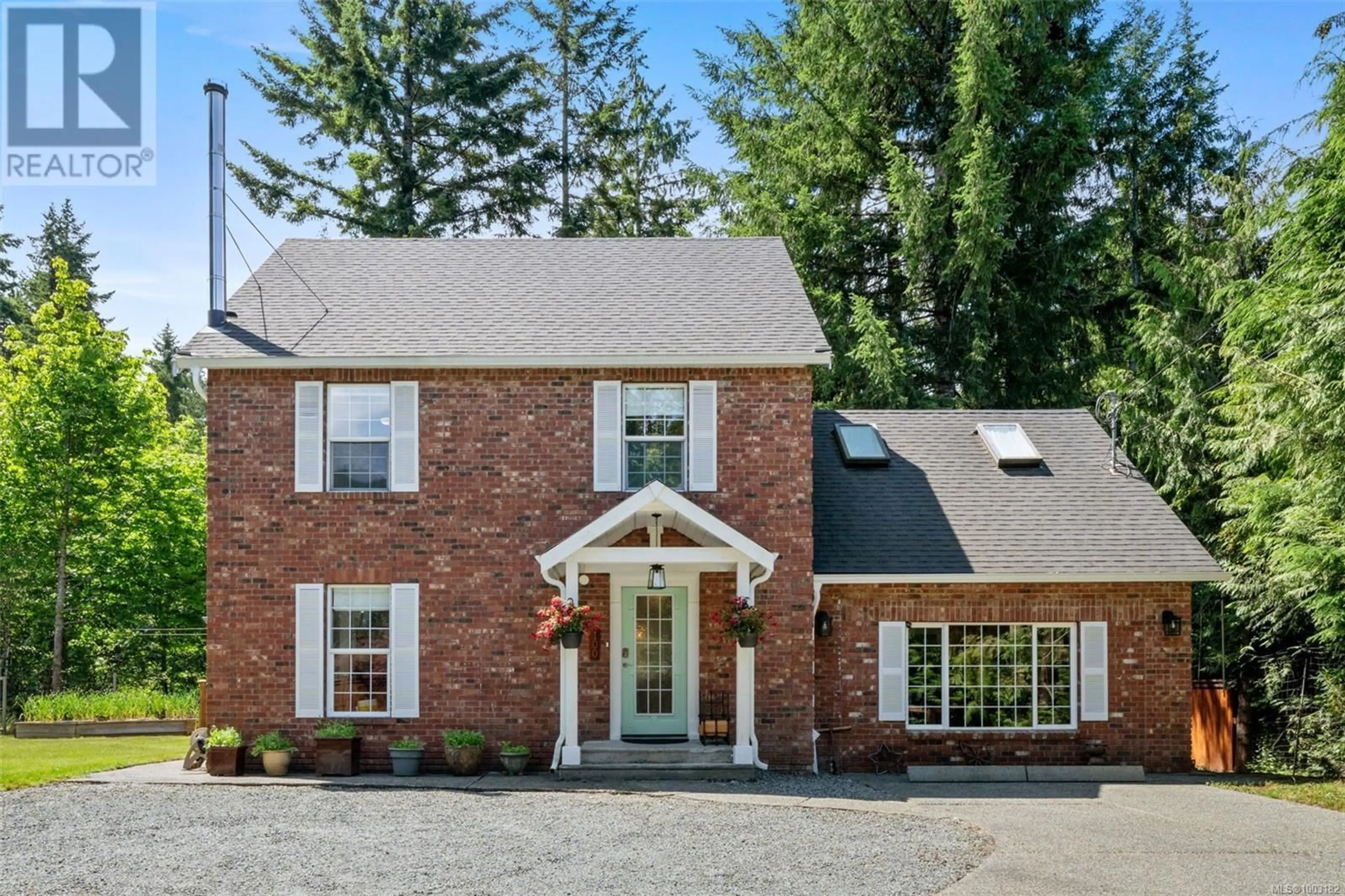 Home with brick exterior material, street for 100 COMIAKEN AVENUE, Lake Cowichan British Columbia V0R2G0