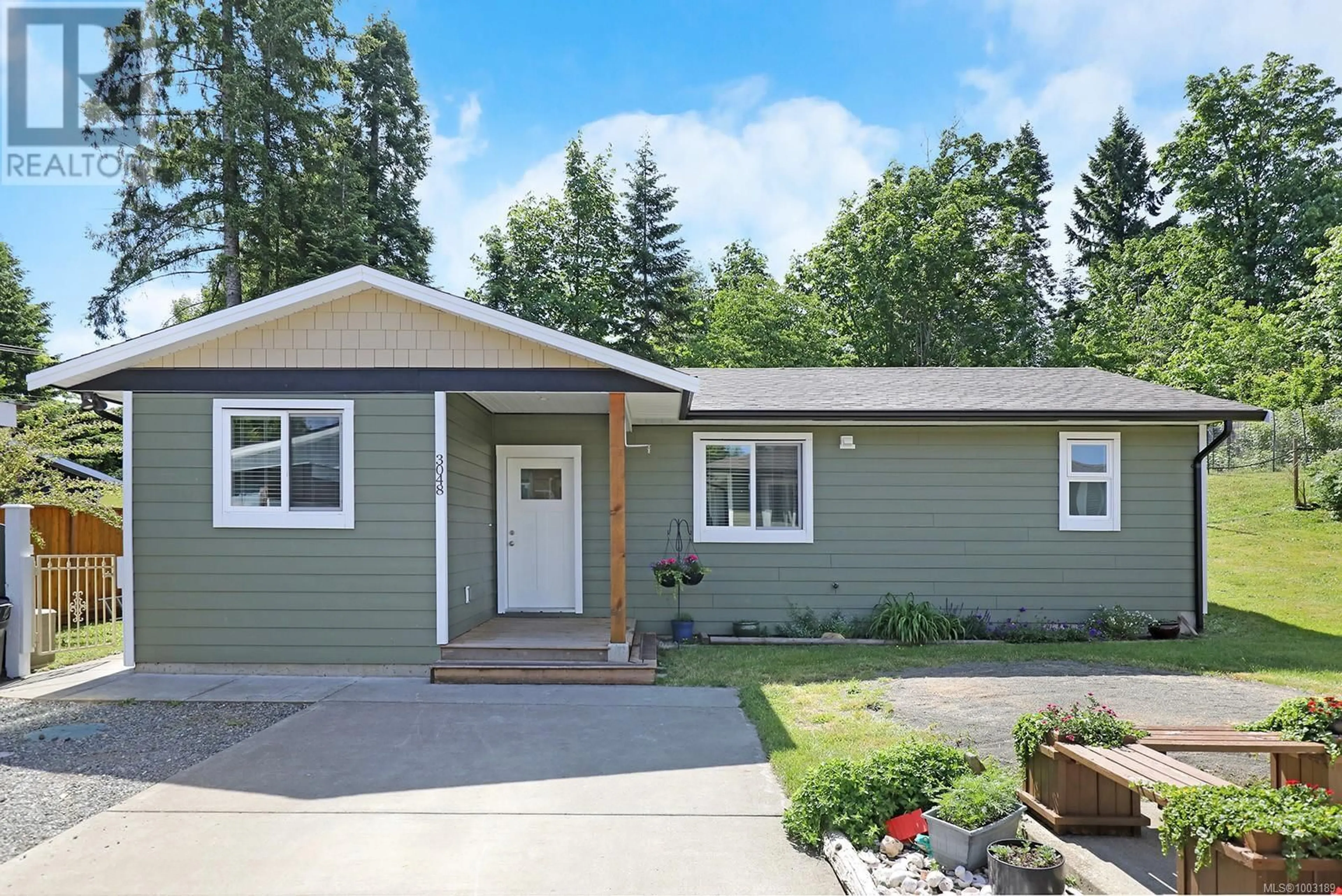 Home with vinyl exterior material, street for 3050/3048 BOOD ROAD, Courtenay British Columbia V9N9V2