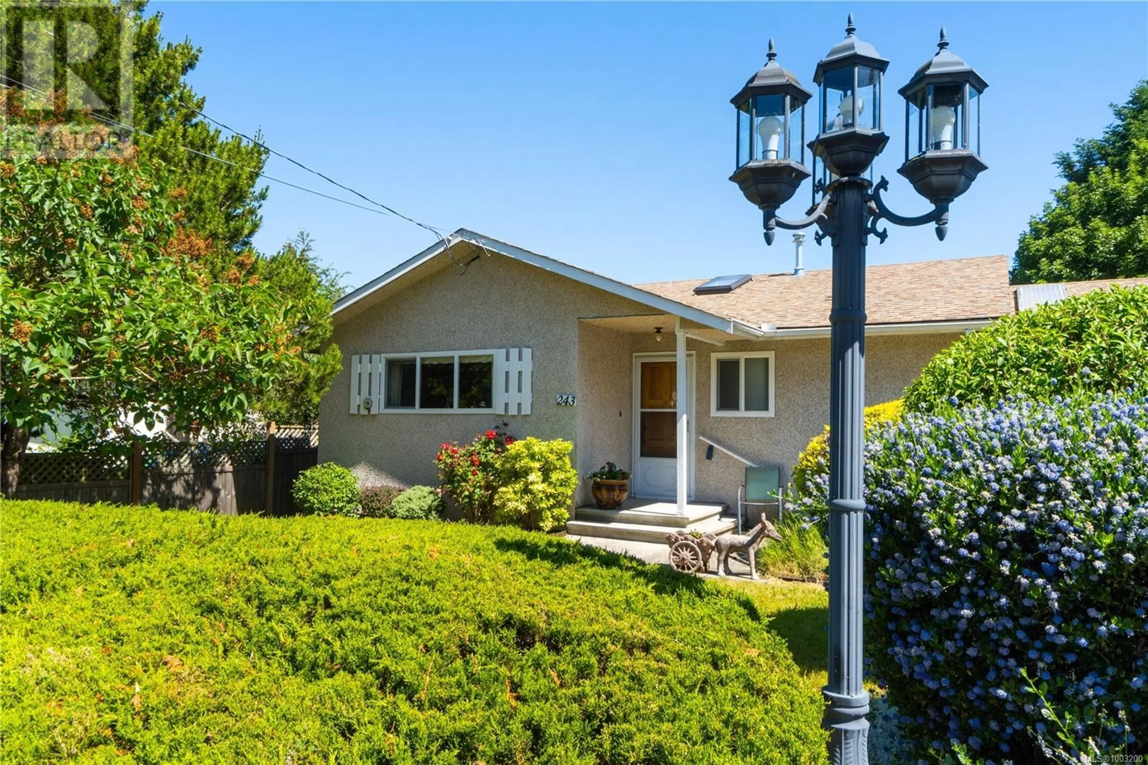 Home with vinyl exterior material, street for 243 HICKEY AVENUE, Parksville British Columbia V9P1J7