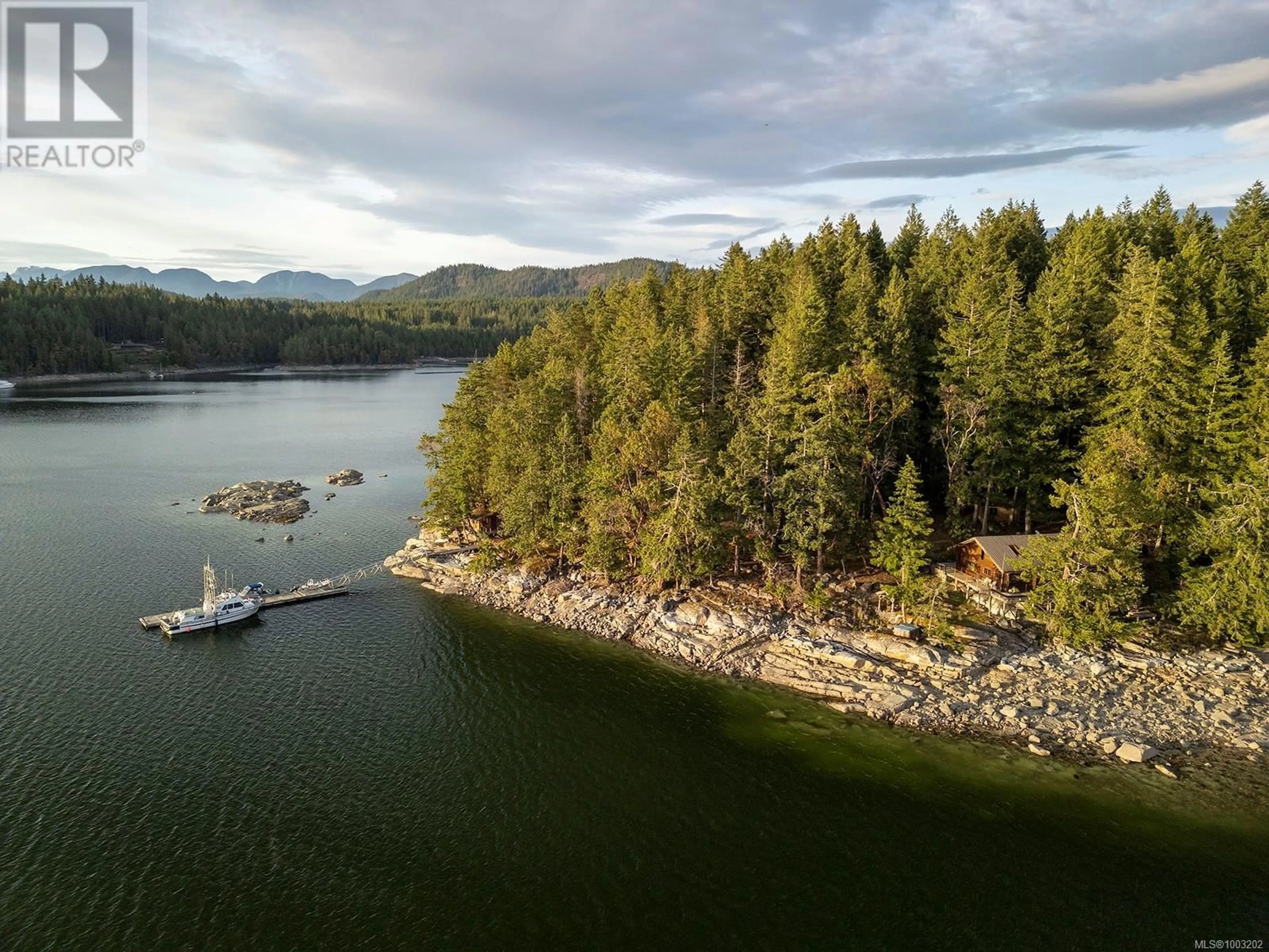 A pic from outside/outdoor area/front of a property/back of a property/a pic from drone, water/lake/river/ocean view for 0 TAN ISLAND, Cortes Island British Columbia V0P1Z0