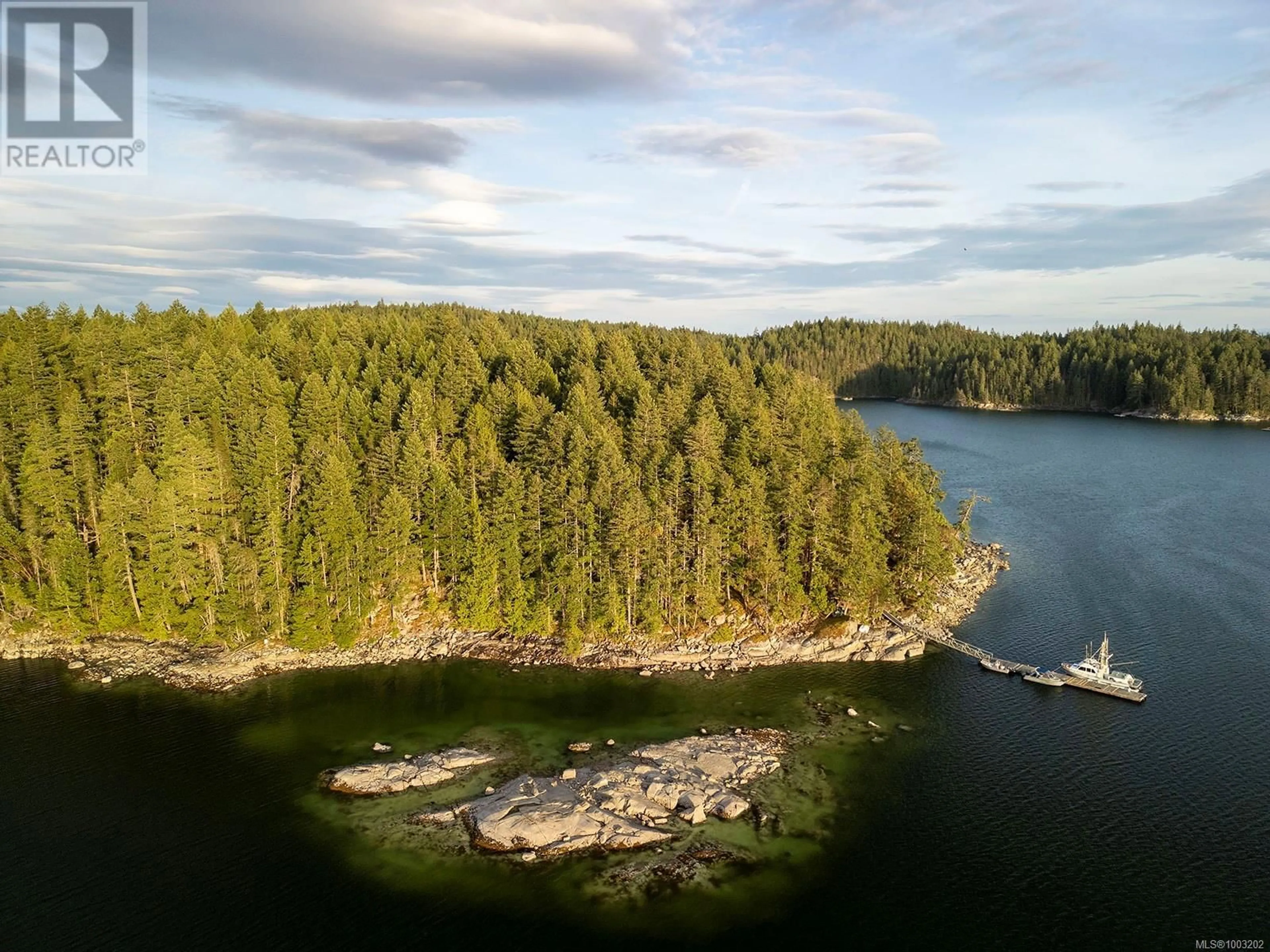 A pic from outside/outdoor area/front of a property/back of a property/a pic from drone, water/lake/river/ocean view for 0 TAN ISLAND, Cortes Island British Columbia V0P1Z0