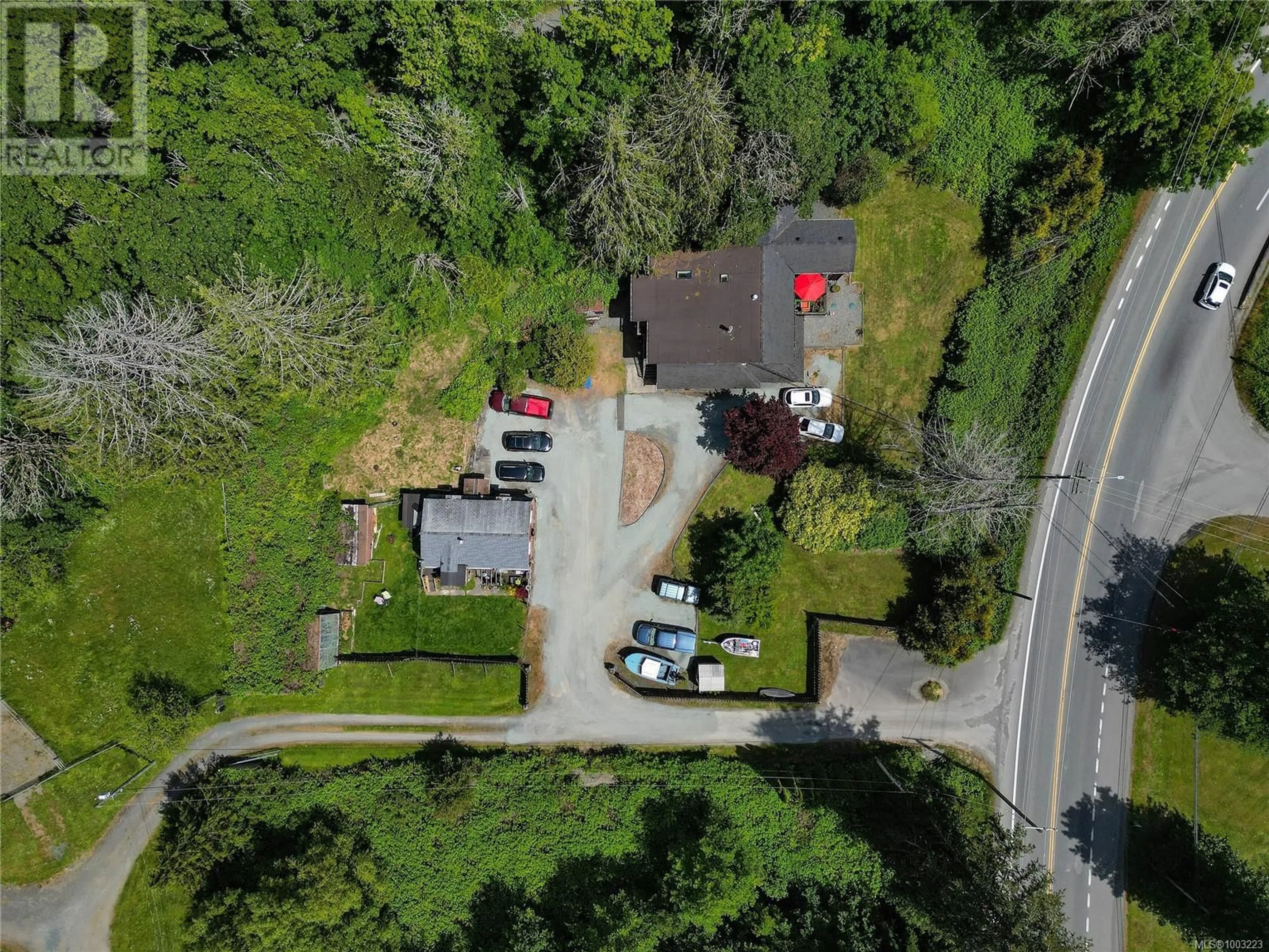 A pic from outside/outdoor area/front of a property/back of a property/a pic from drone, street for 5440 SOOKE ROAD, Sooke British Columbia V9Z0C8